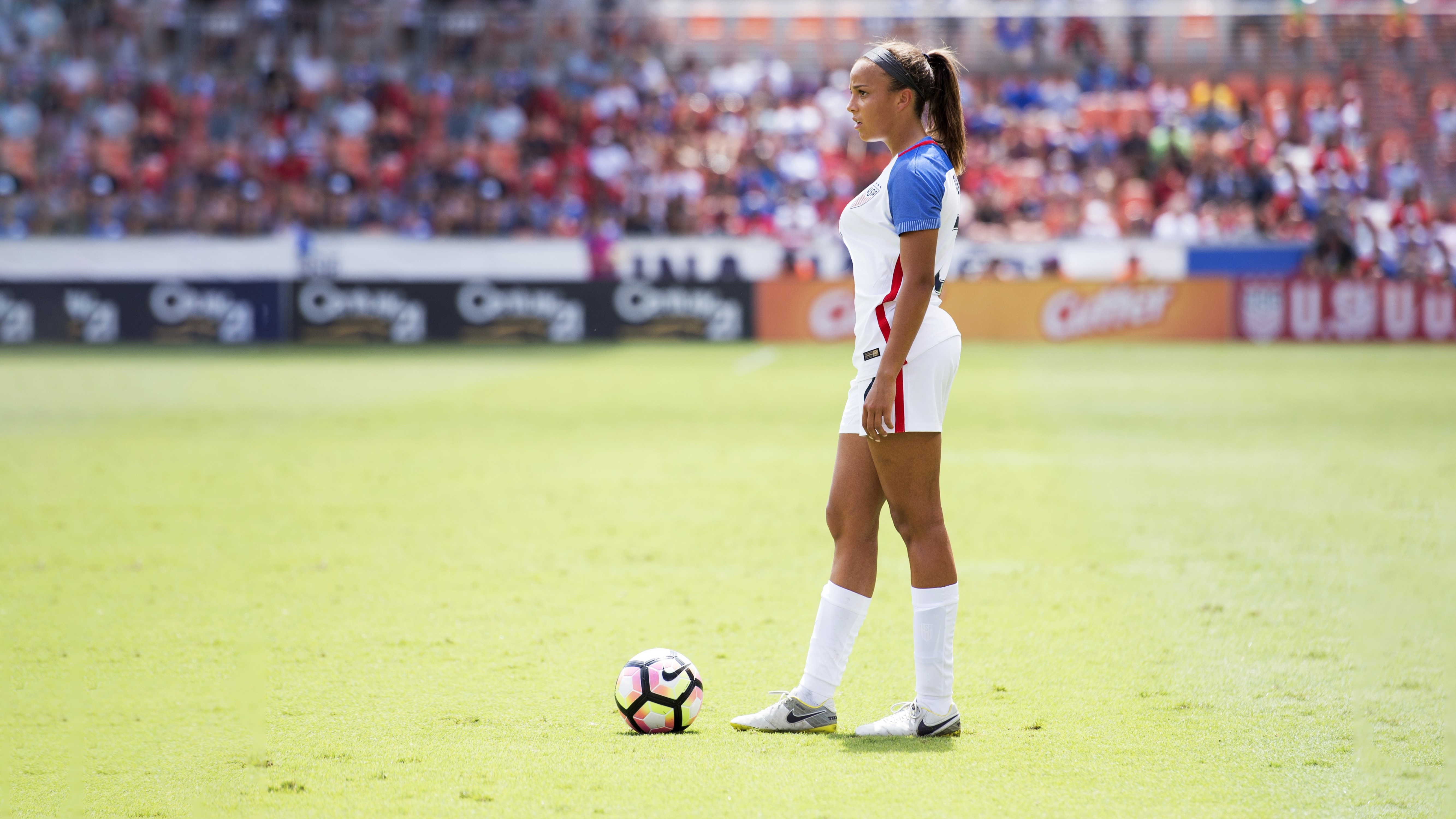 Soccer player with ball on field HD Wallpaper