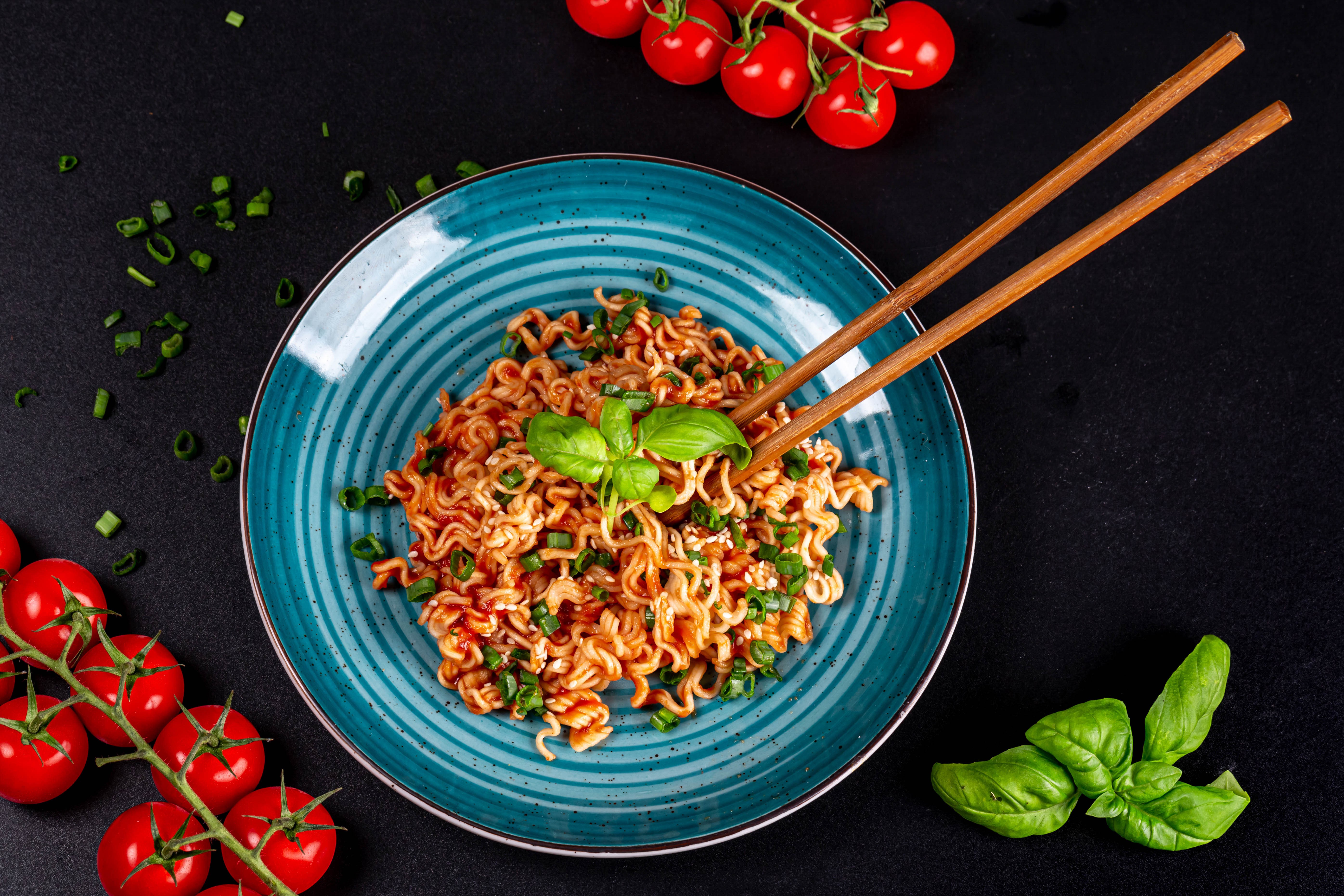 Noodles with Tomatoes and Basil on Black Background HD Wallpaper
