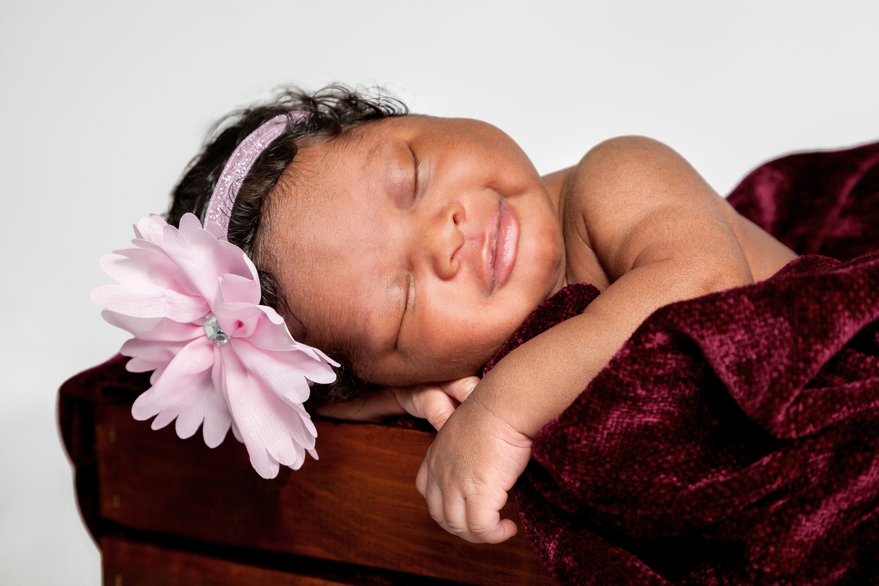 Sleeping Baby Girl with Pink Flower Headband HD Wallpaper