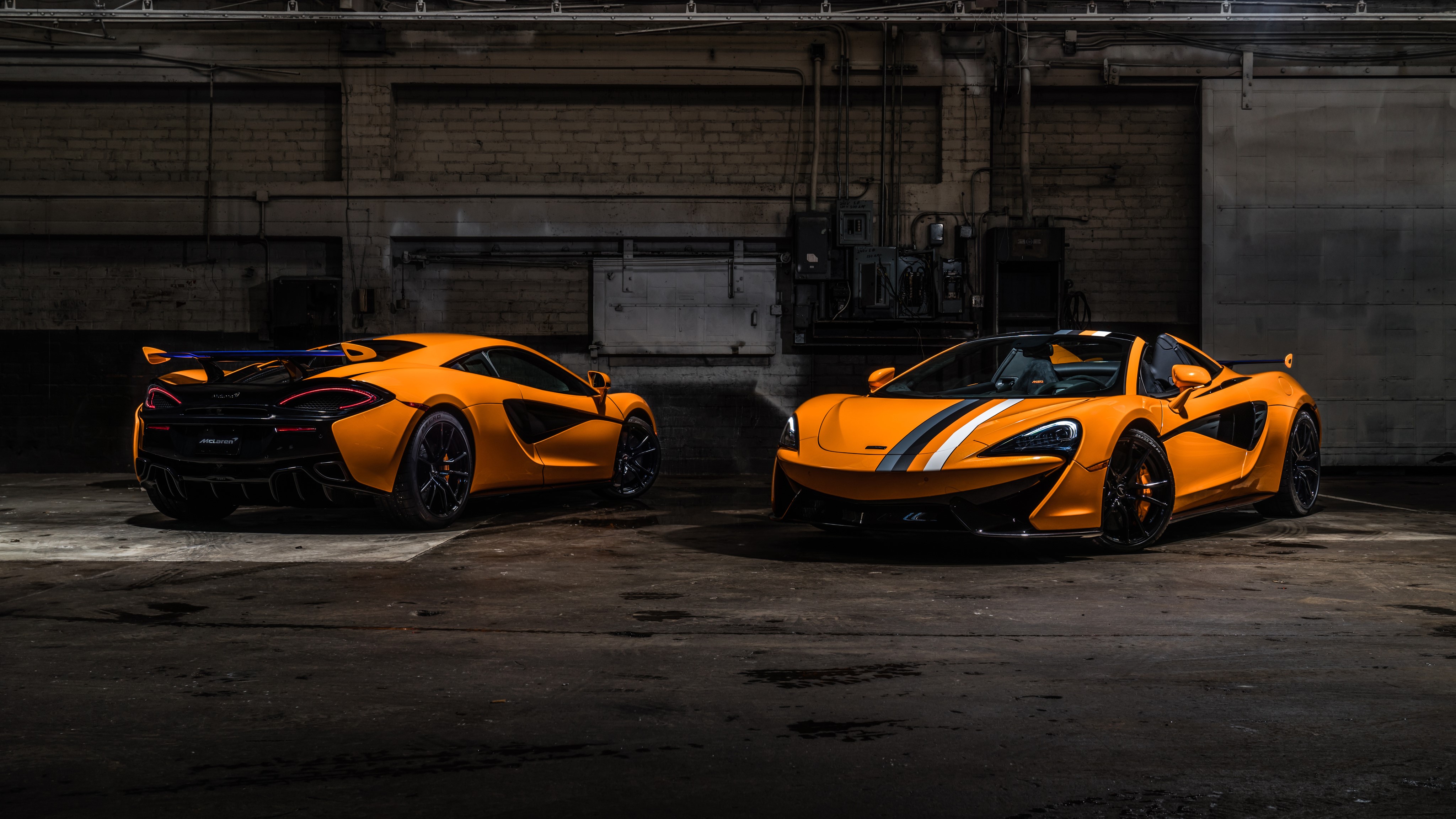 Two orange McLaren 570S Roadsters HD Wallpaper