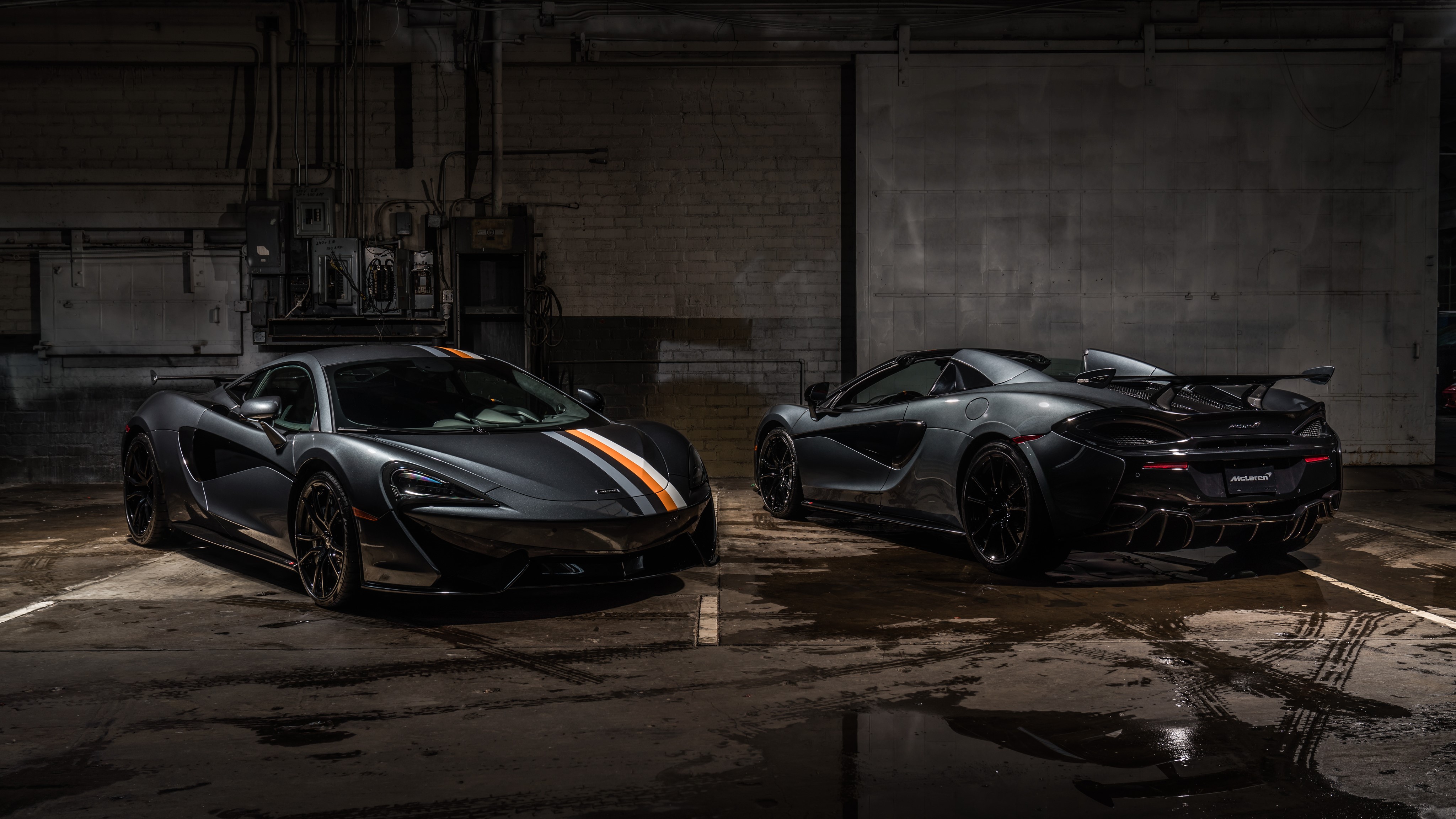 Two McLaren 570S Roadsters in a Garage HD Wallpaper