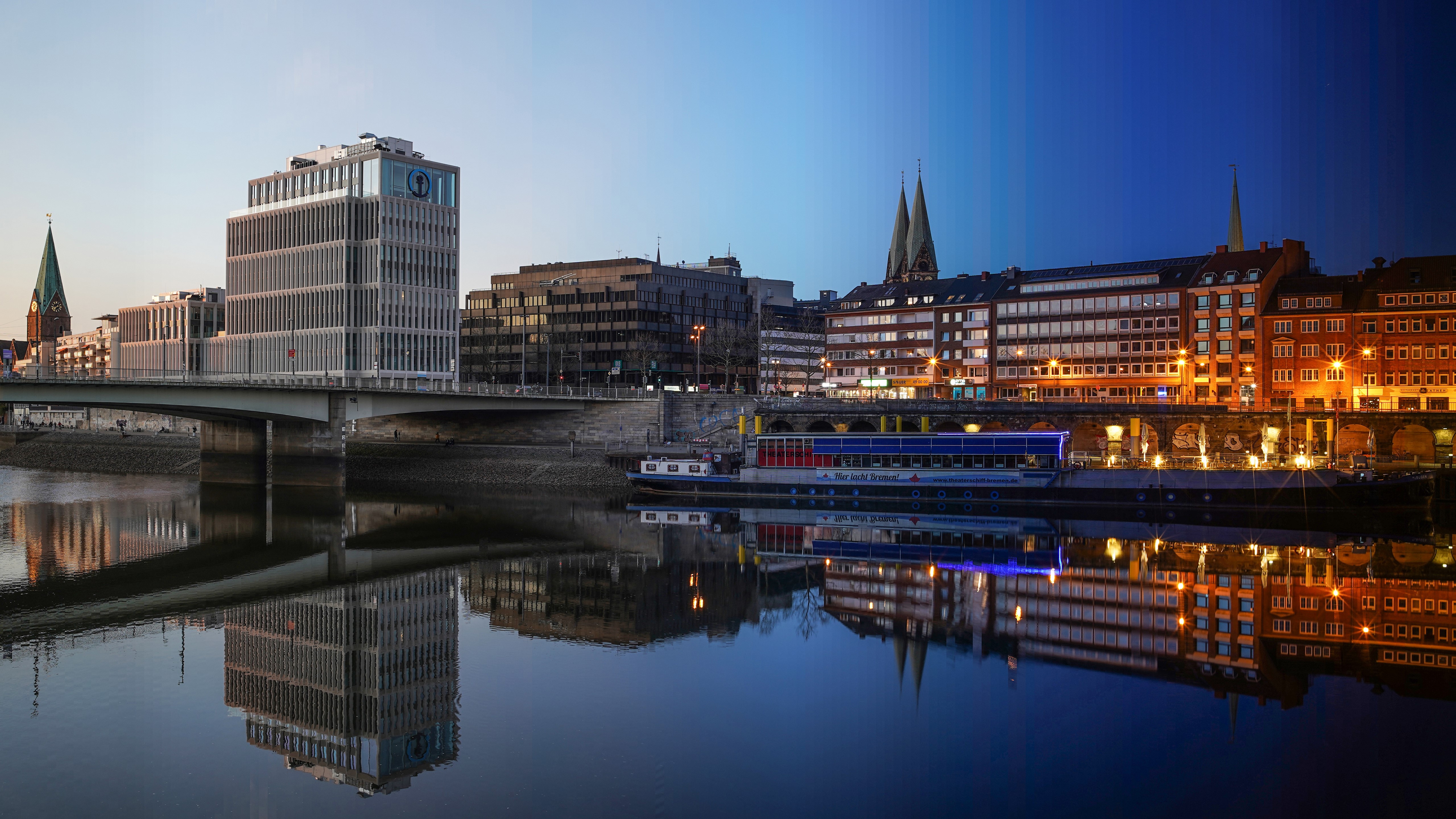 Bremen, Germany: River and Cityscape at Dusk HD Wallpaper