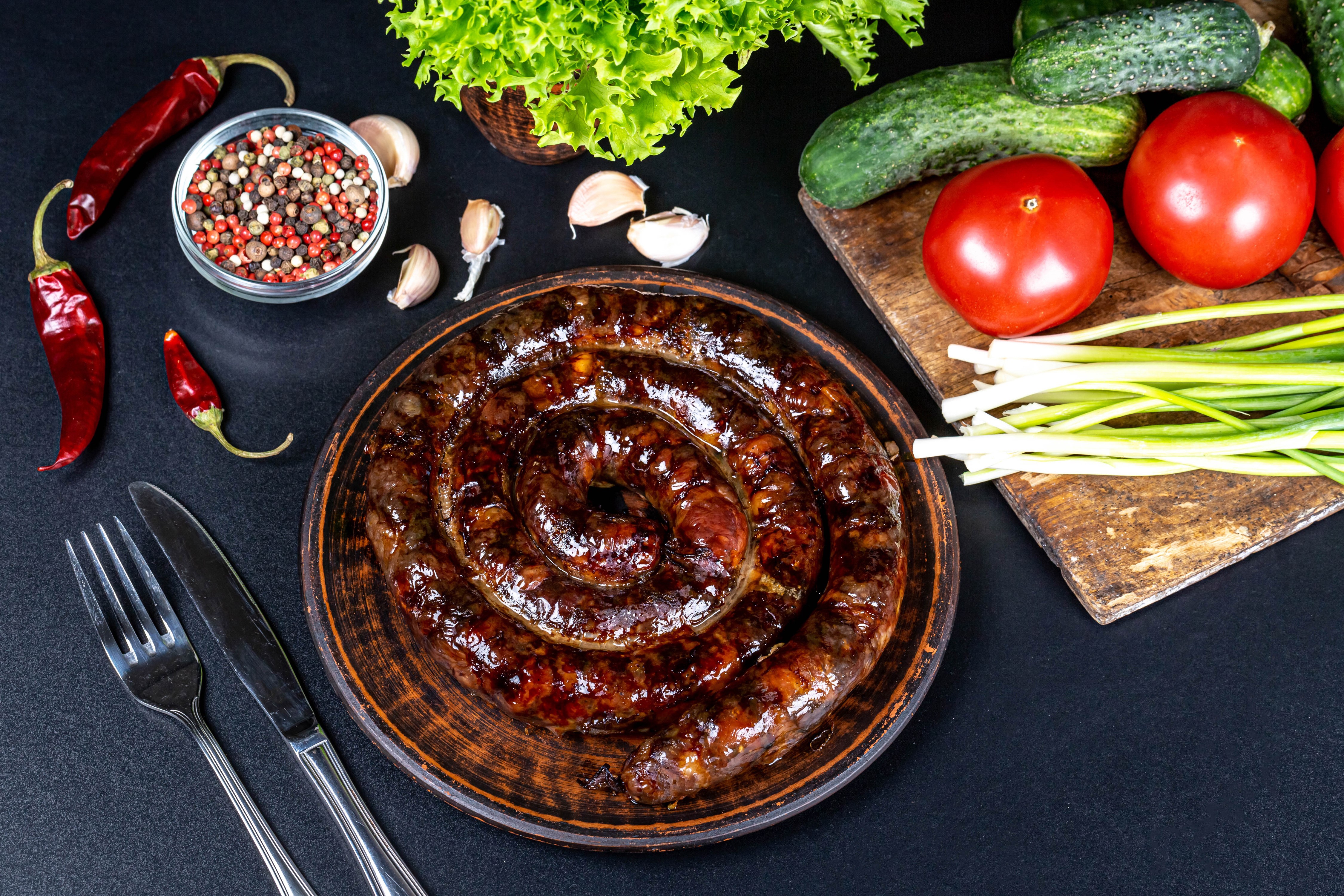 Spiral Sausage with Vegetables and Spices HD Wallpaper