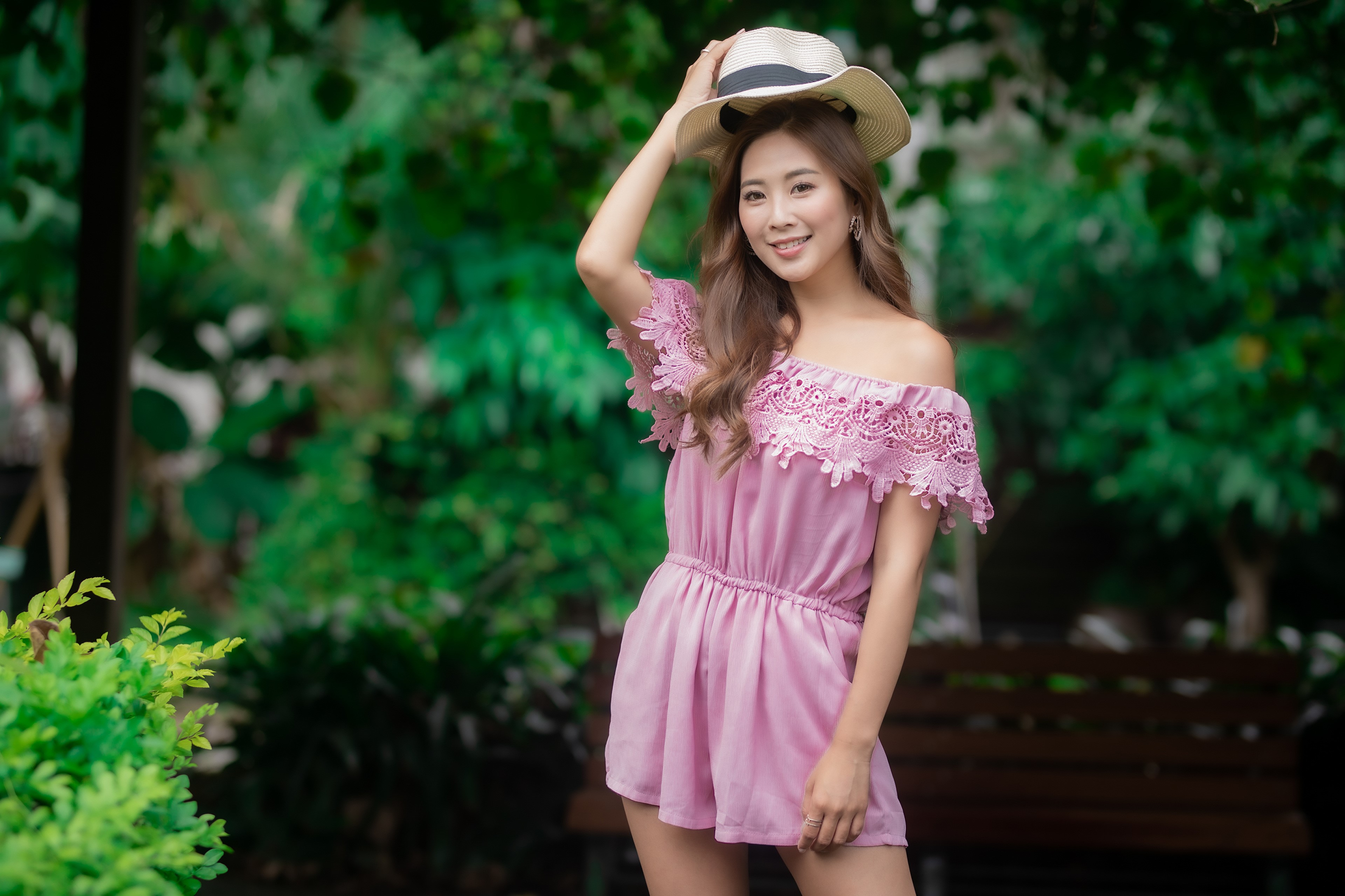 Asian woman in pink romper wearing a hat HD Wallpaper