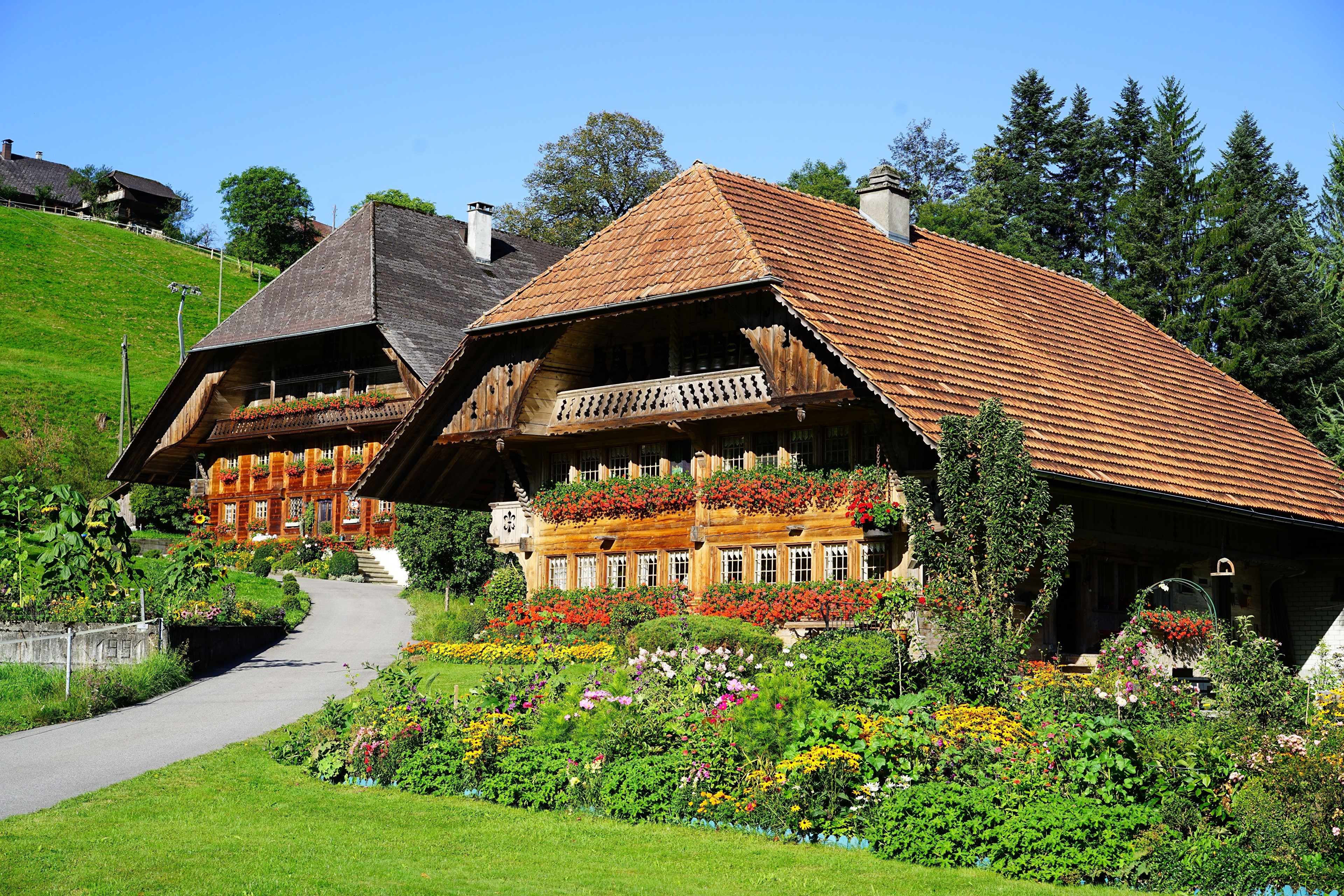 Traditional Swiss Houses with Flower Boxes HD Wallpaper