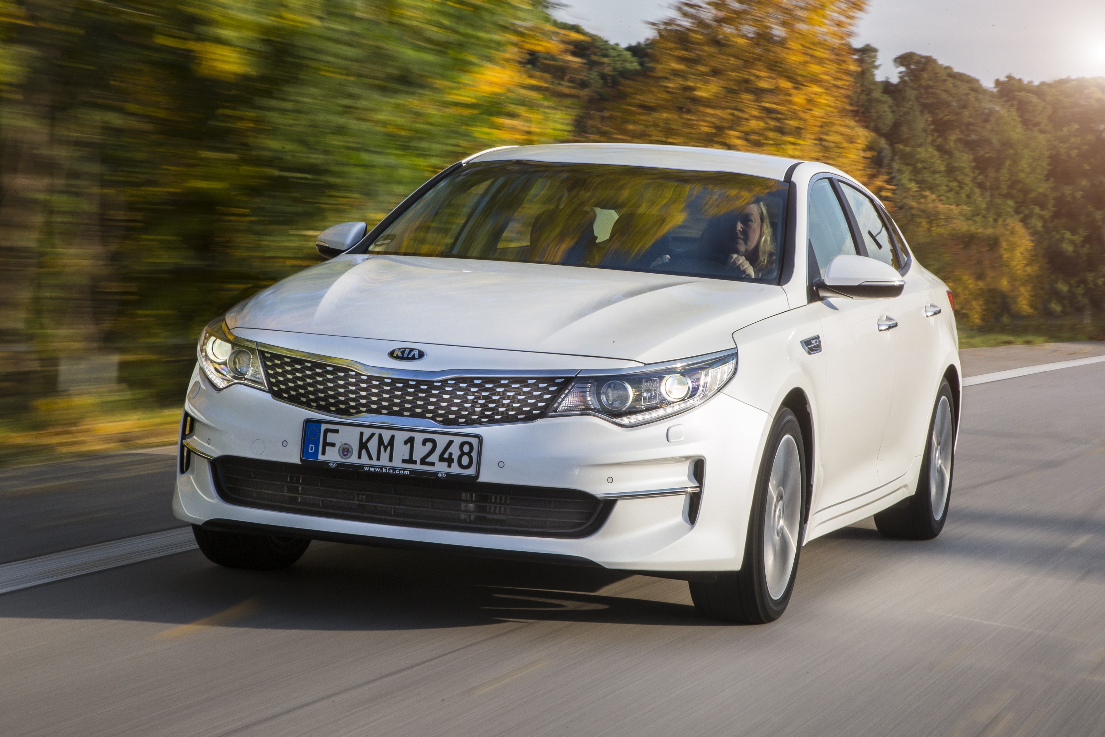 White 2015 Kia Optima Sedan in Motion HD Wallpaper