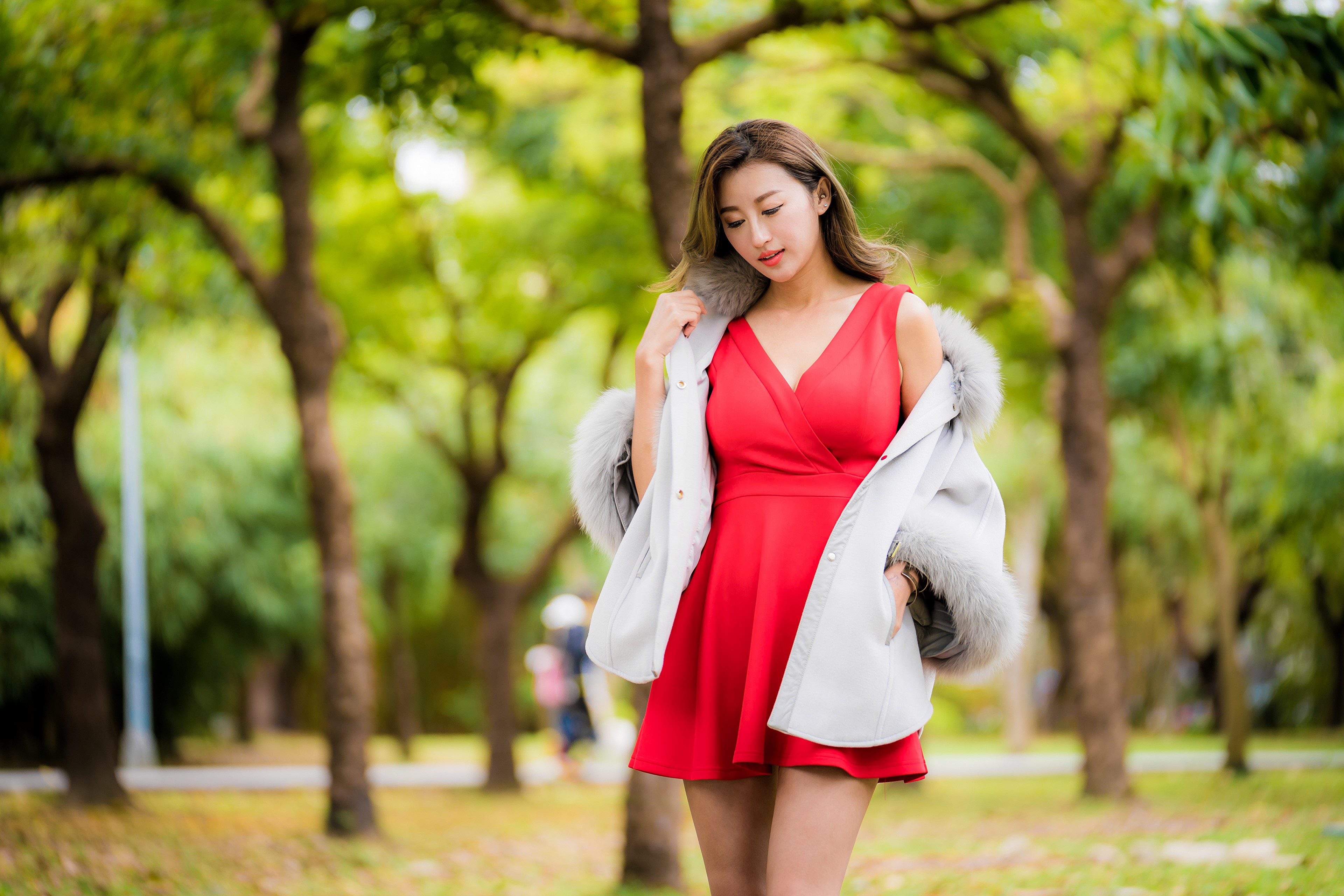 Asian woman in red dress with fur-lined coat HD Wallpaper