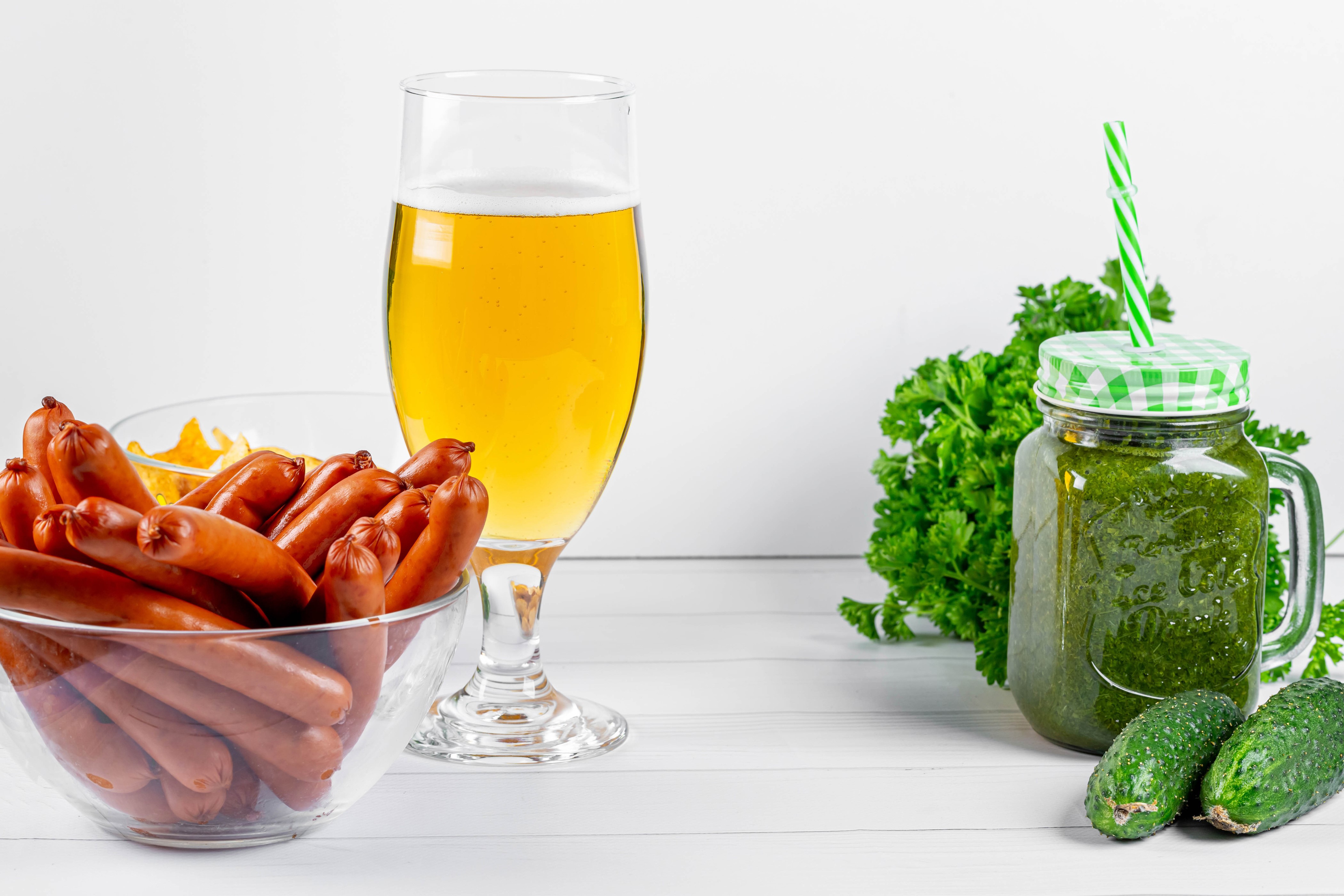 Beer, sausages, smoothie, cucumbers, and parsley HD Wallpaper