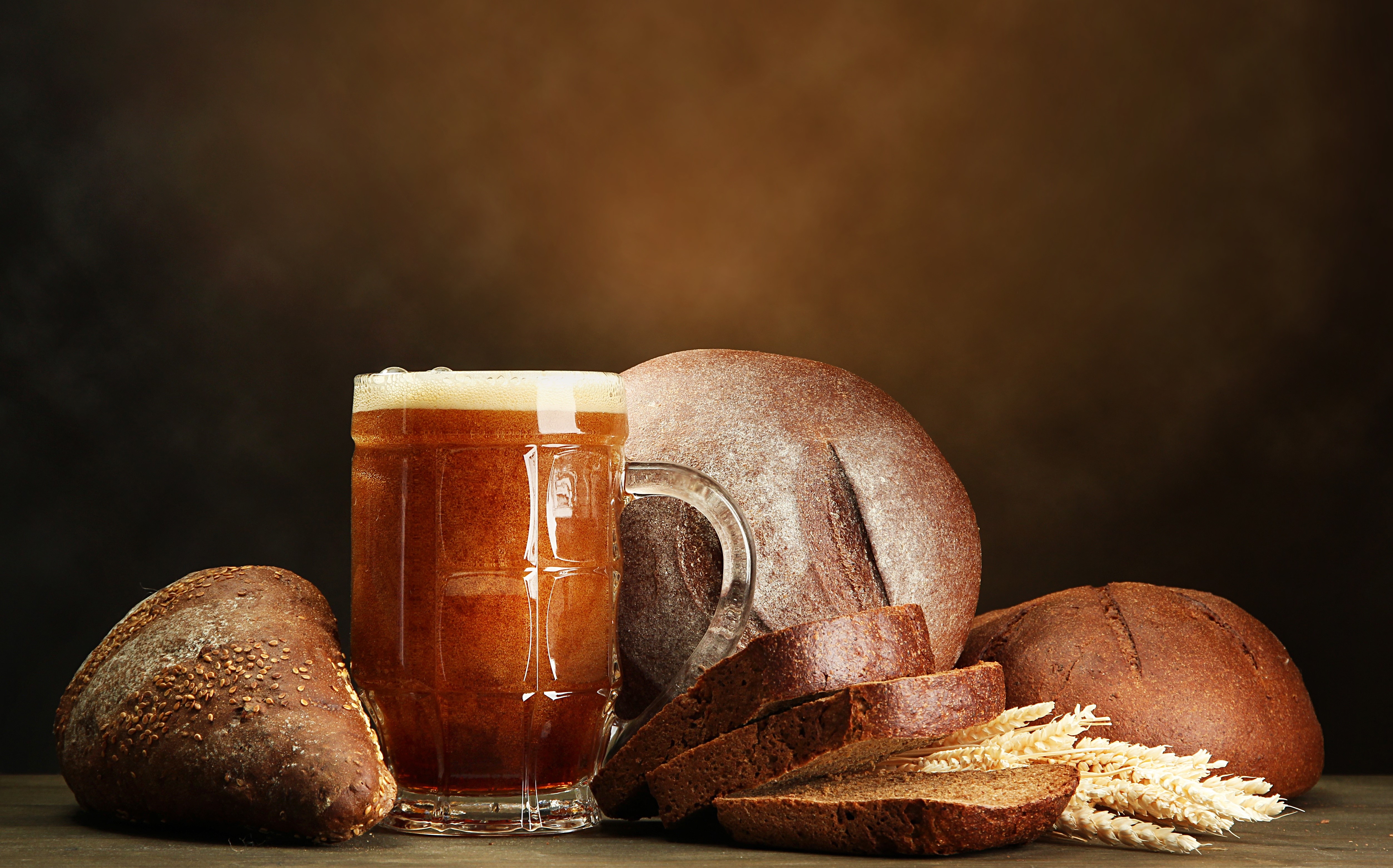 Kvass in a mug with bread and wheat HD Wallpaper