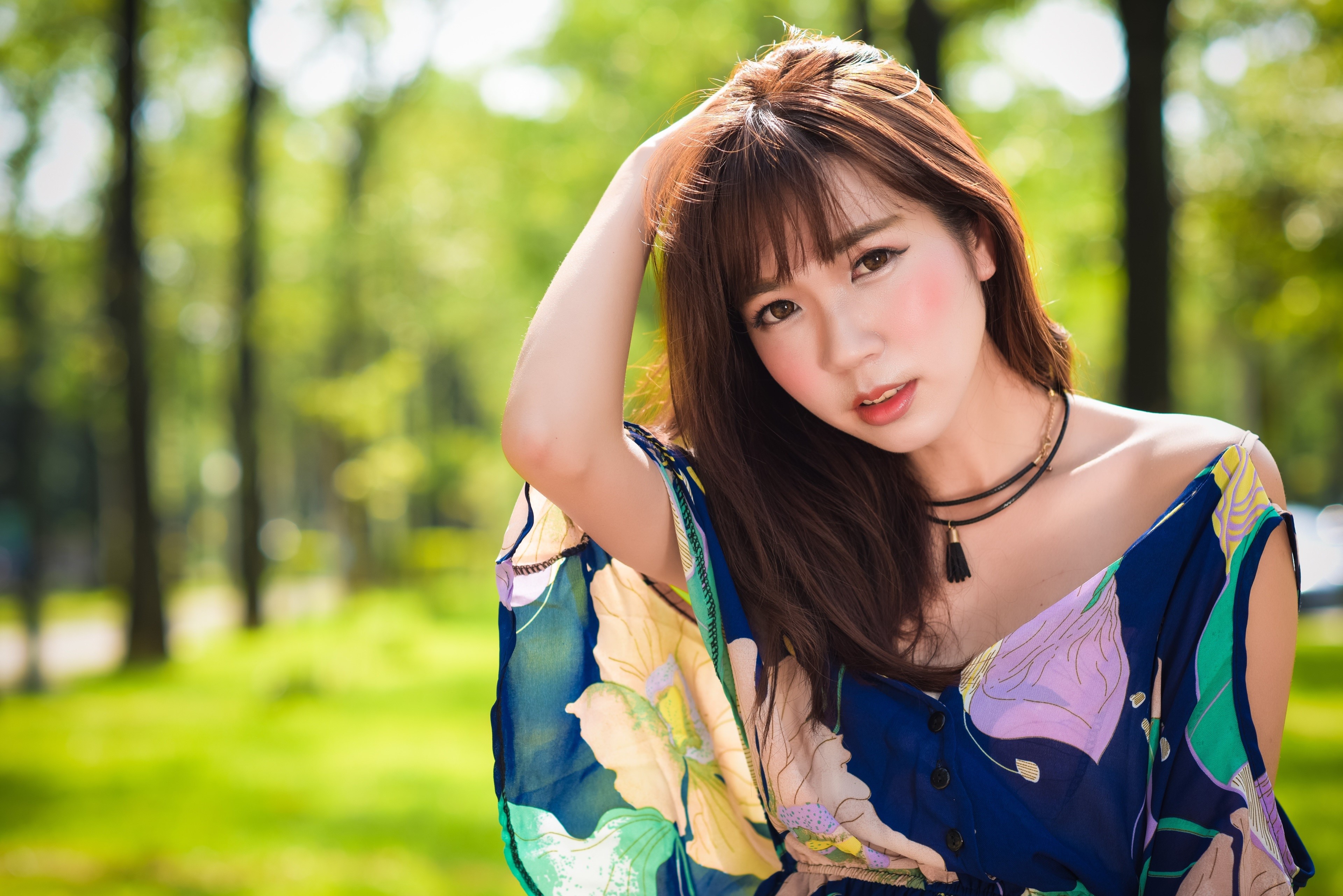 Asian woman with brown hair in a floral dress HD Wallpaper