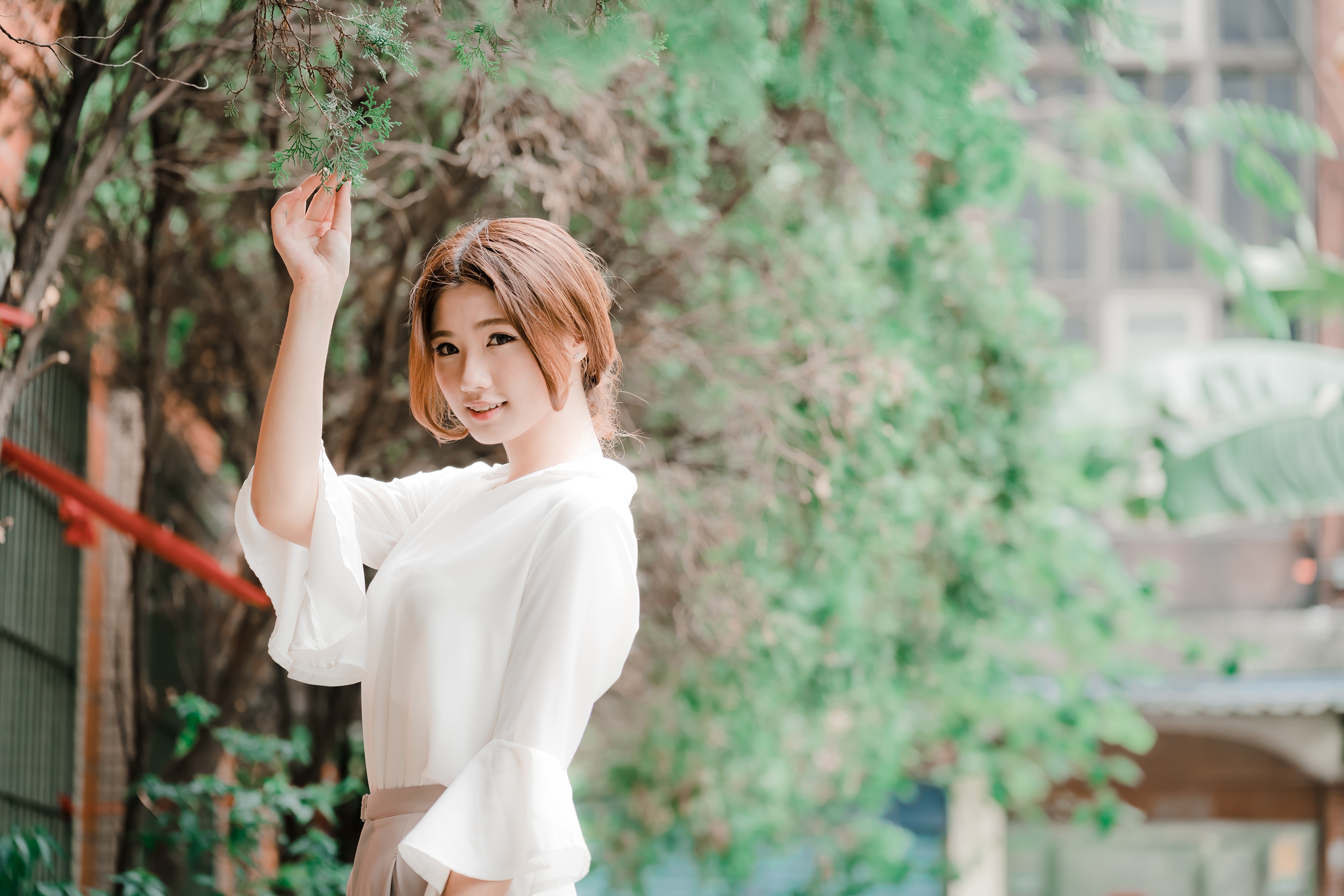 Asian woman with brown hair in white shirt HD Wallpaper