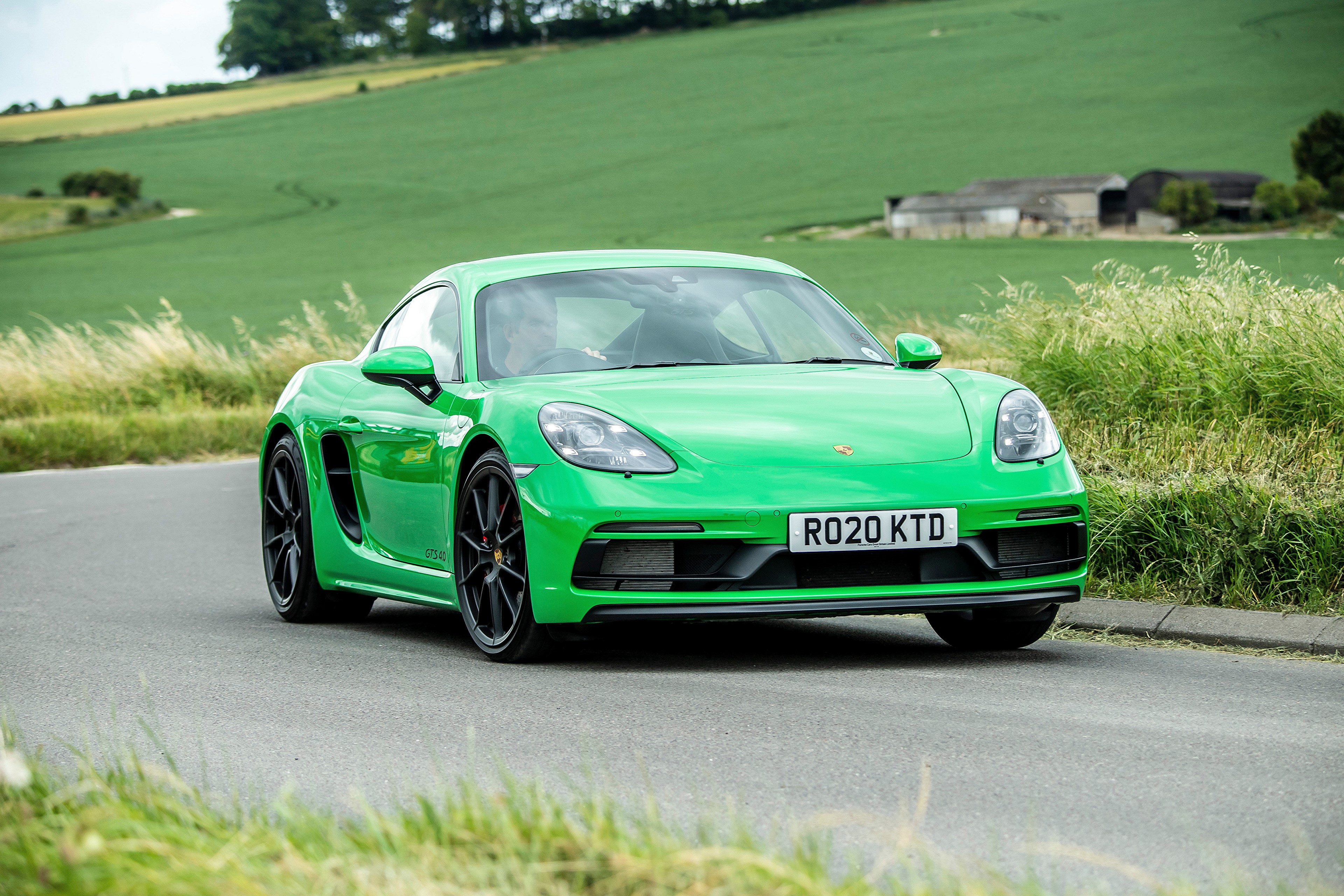 Green Porsche 718 Cayman GTS 4.0 on UK Road HD Wallpaper