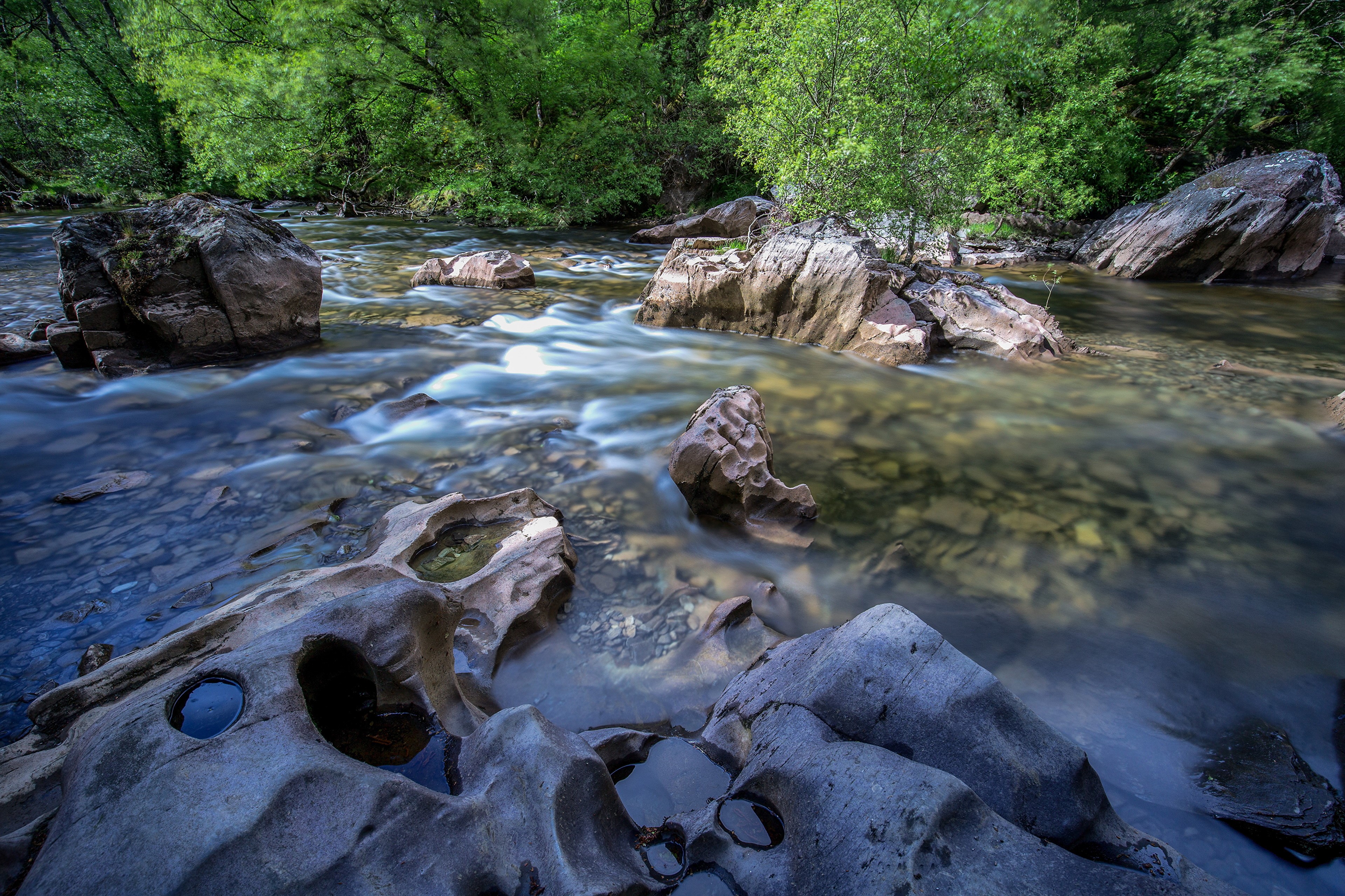 River flowing through rocks in Snowdonia, Wales HD Wallpaper