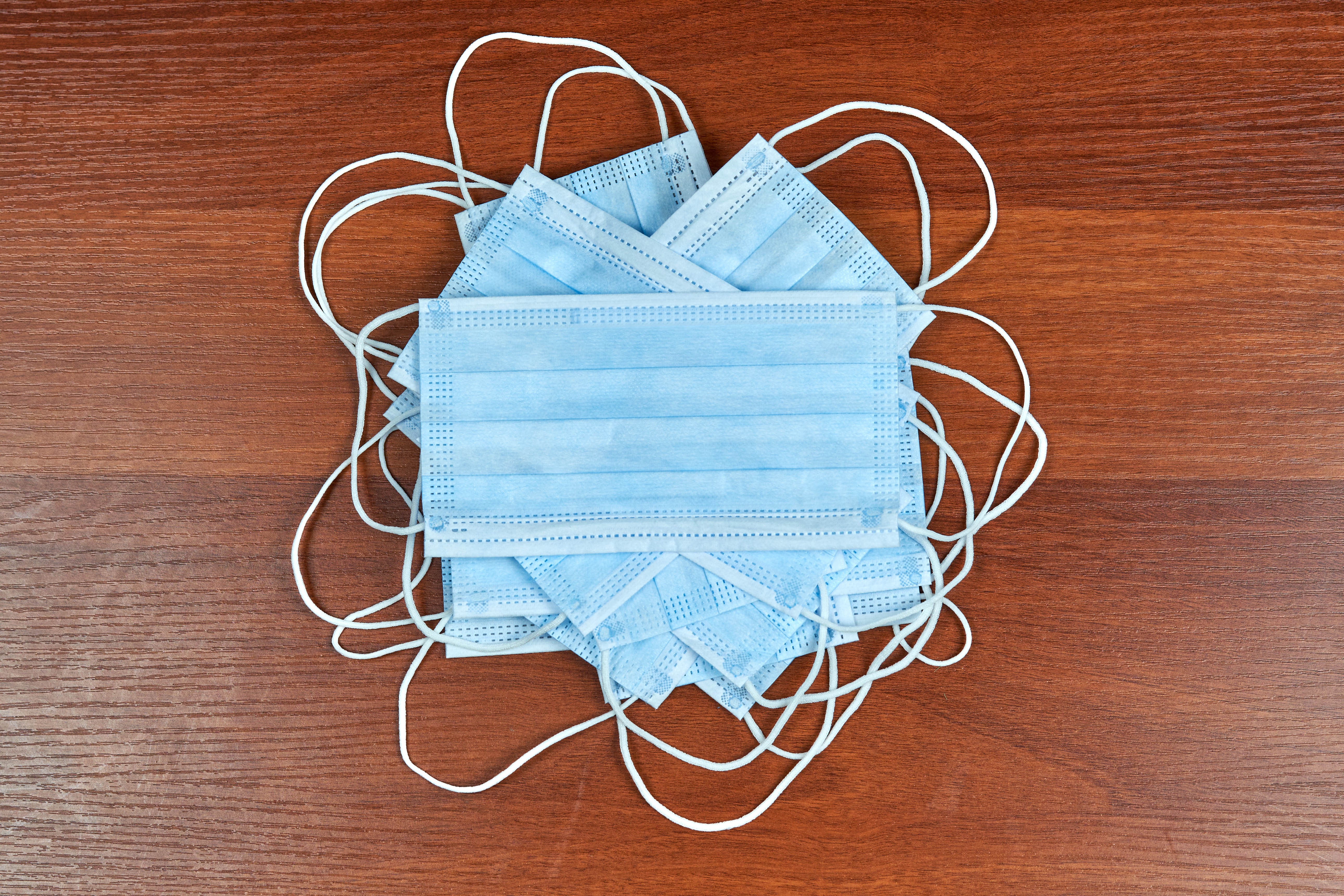 Pile of Light Blue Disposable Masks HD Wallpaper