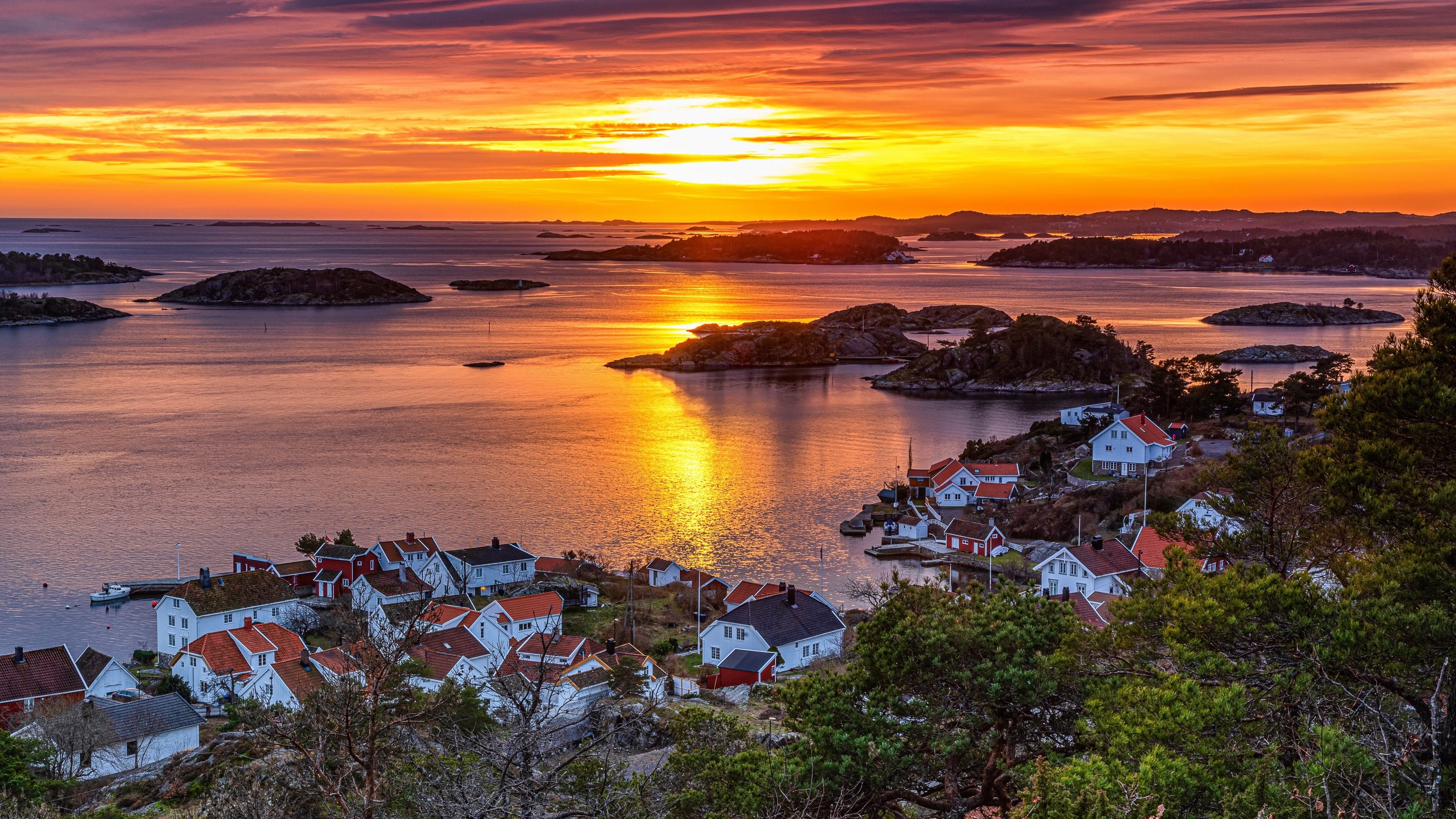 Sunset over a coastal village in Norway HD Wallpaper