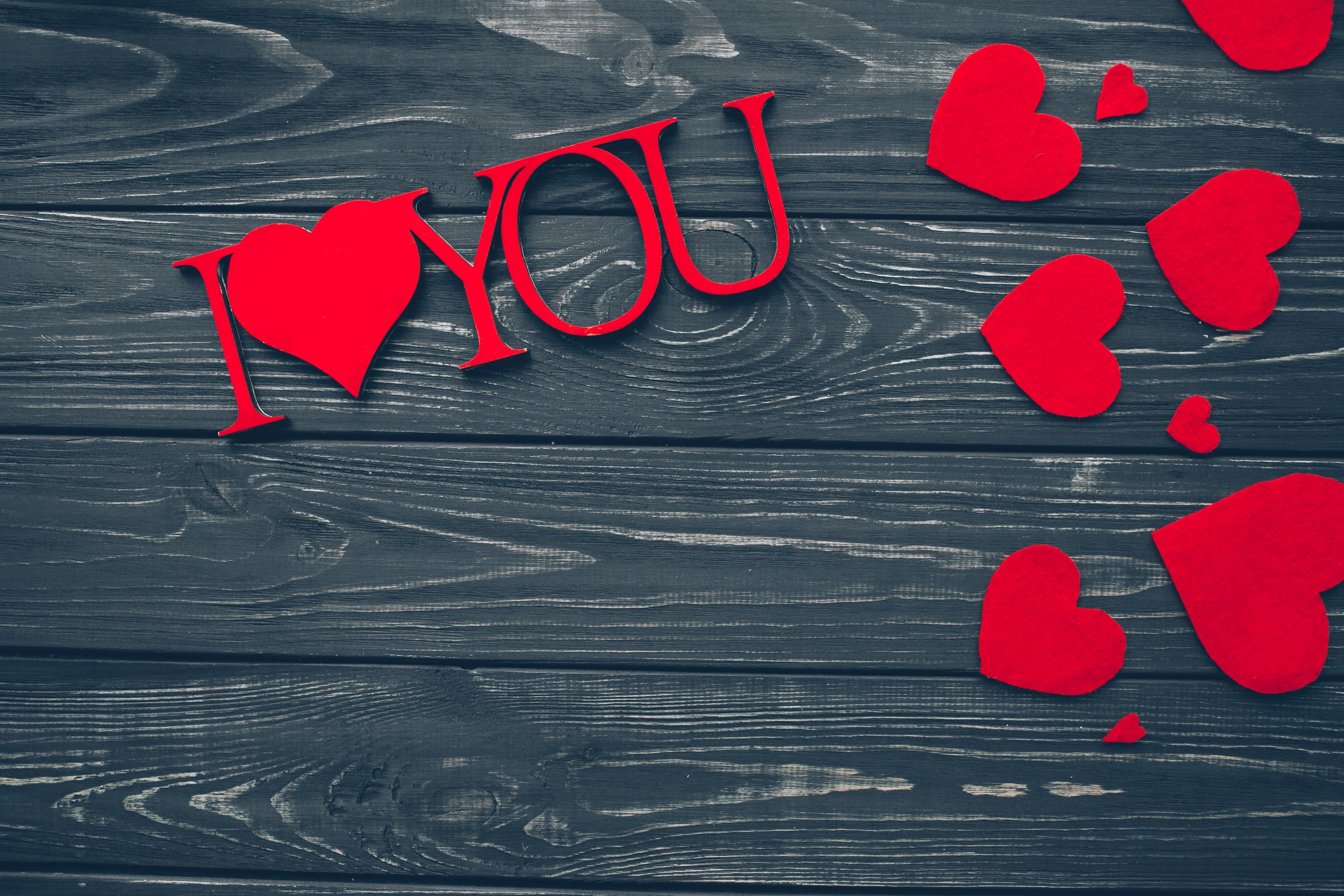 I Love You text with red hearts on wood planks HD Wallpaper