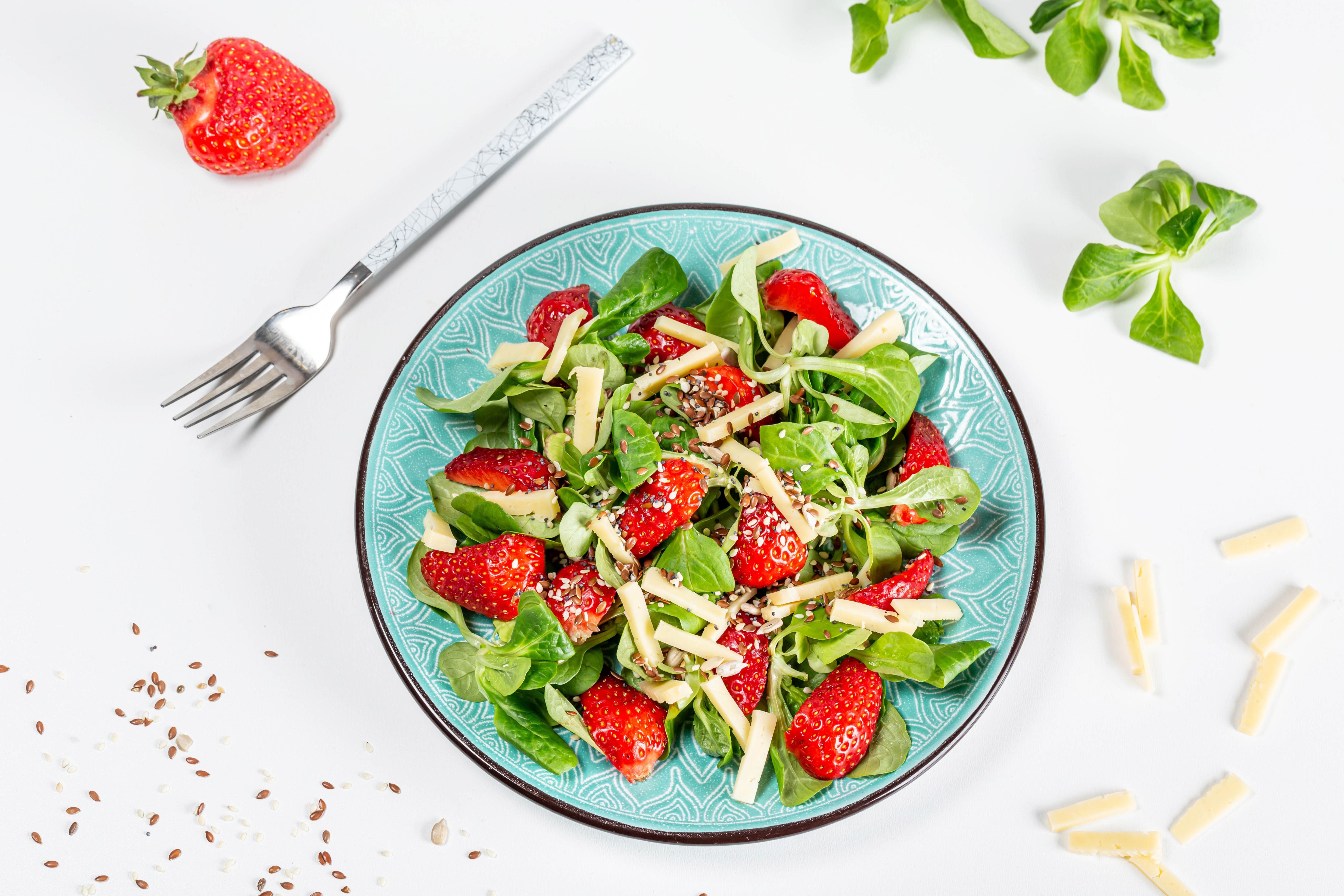 Strawberry Salad with Cheese and Seeds on a Plate HD Wallpaper