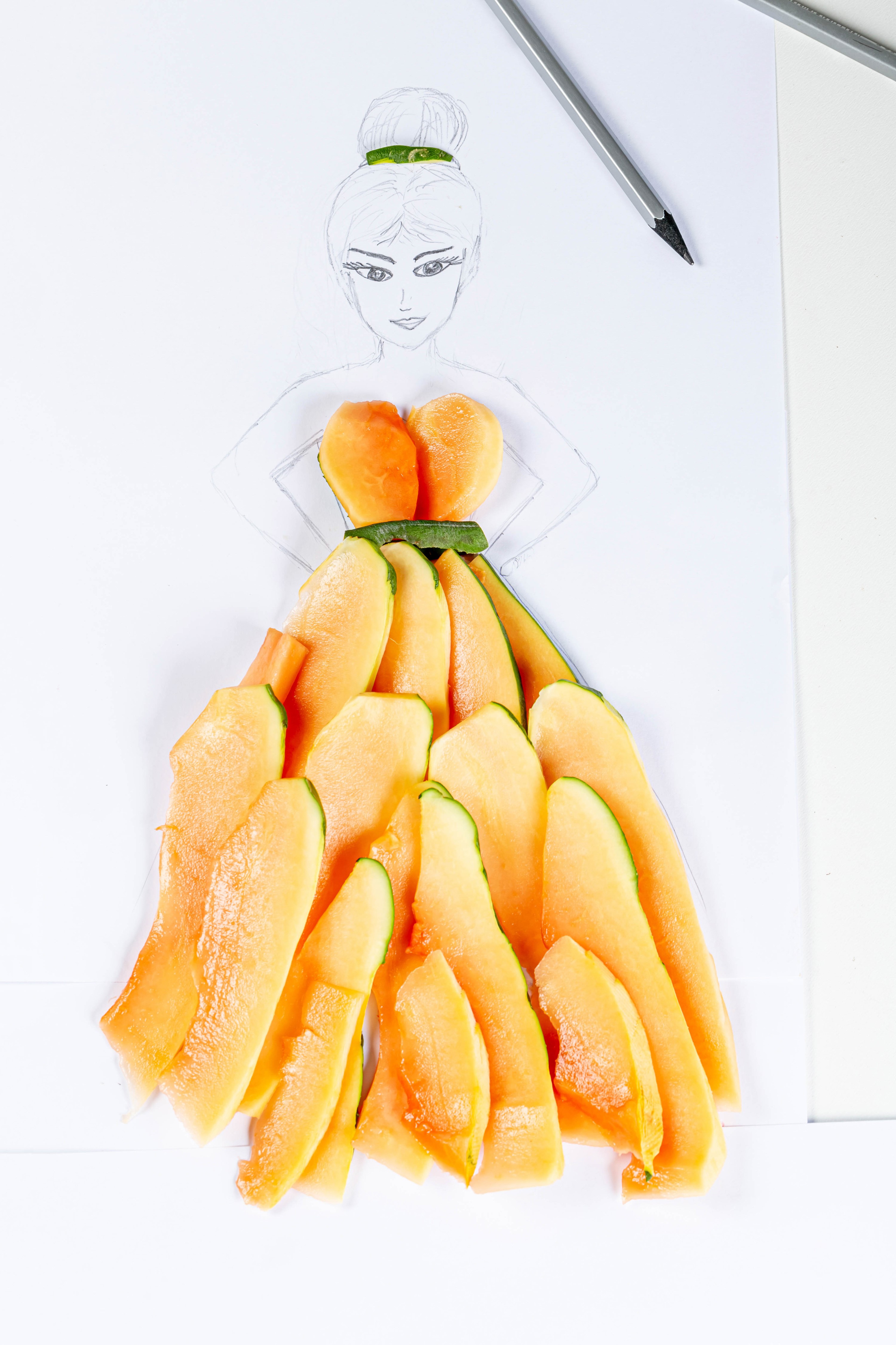 Creative papaya and zucchini dress on a drawing HD Phone Wallpaper