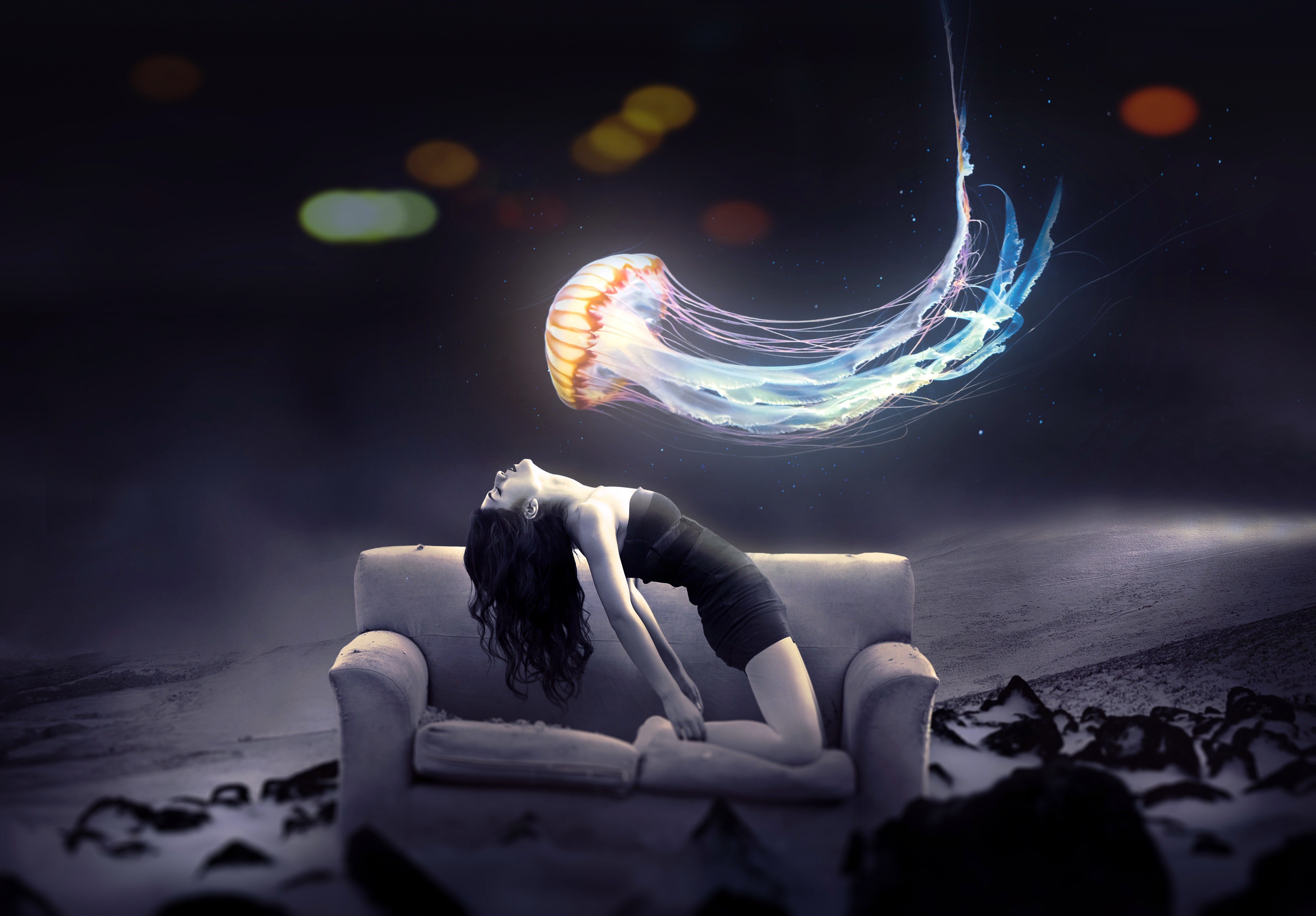 Woman posing on a sofa with a jellyfish HD Wallpaper