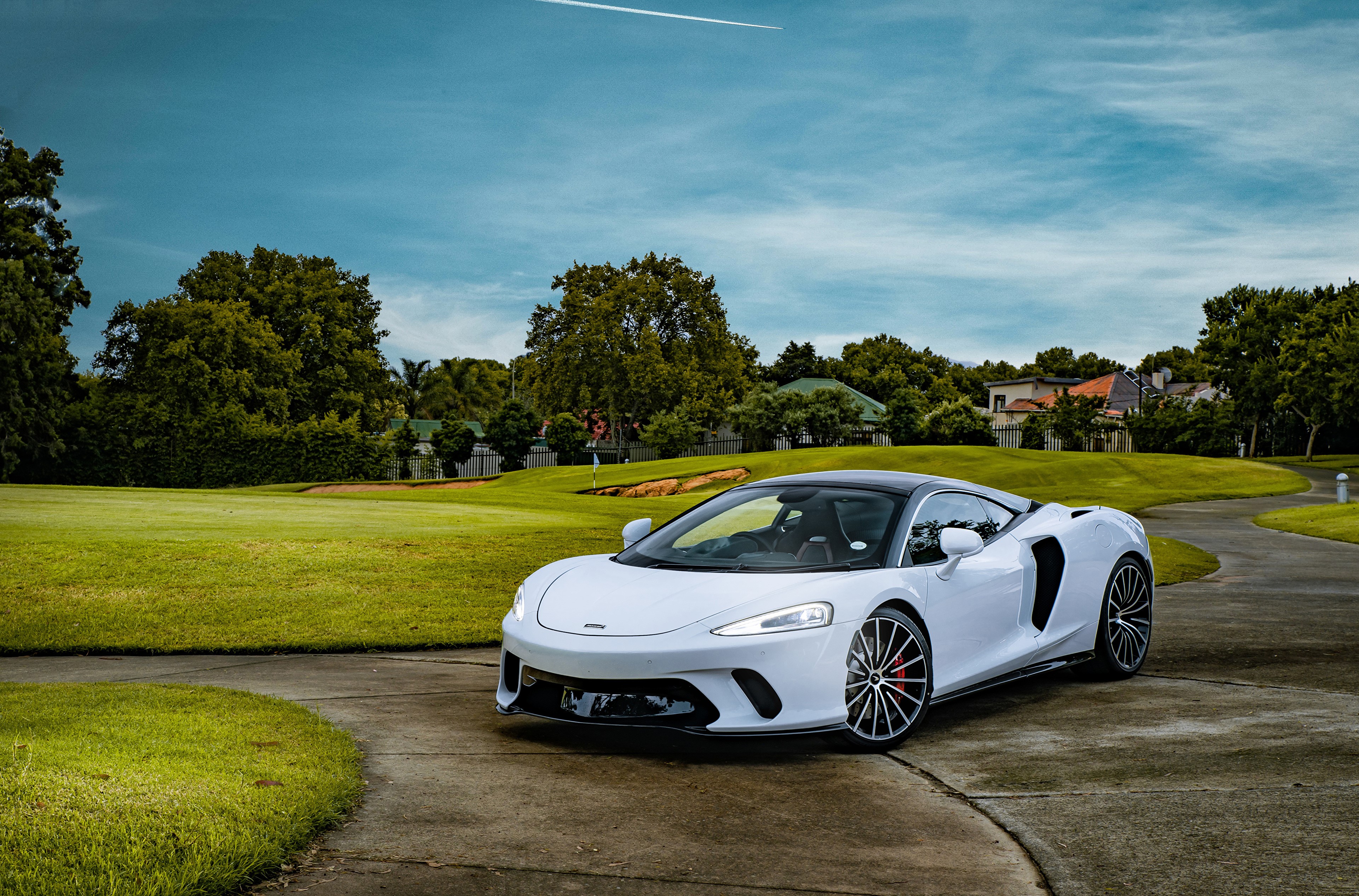 4K White 2020 McLaren GT on a Golf Course HD Wallpaper