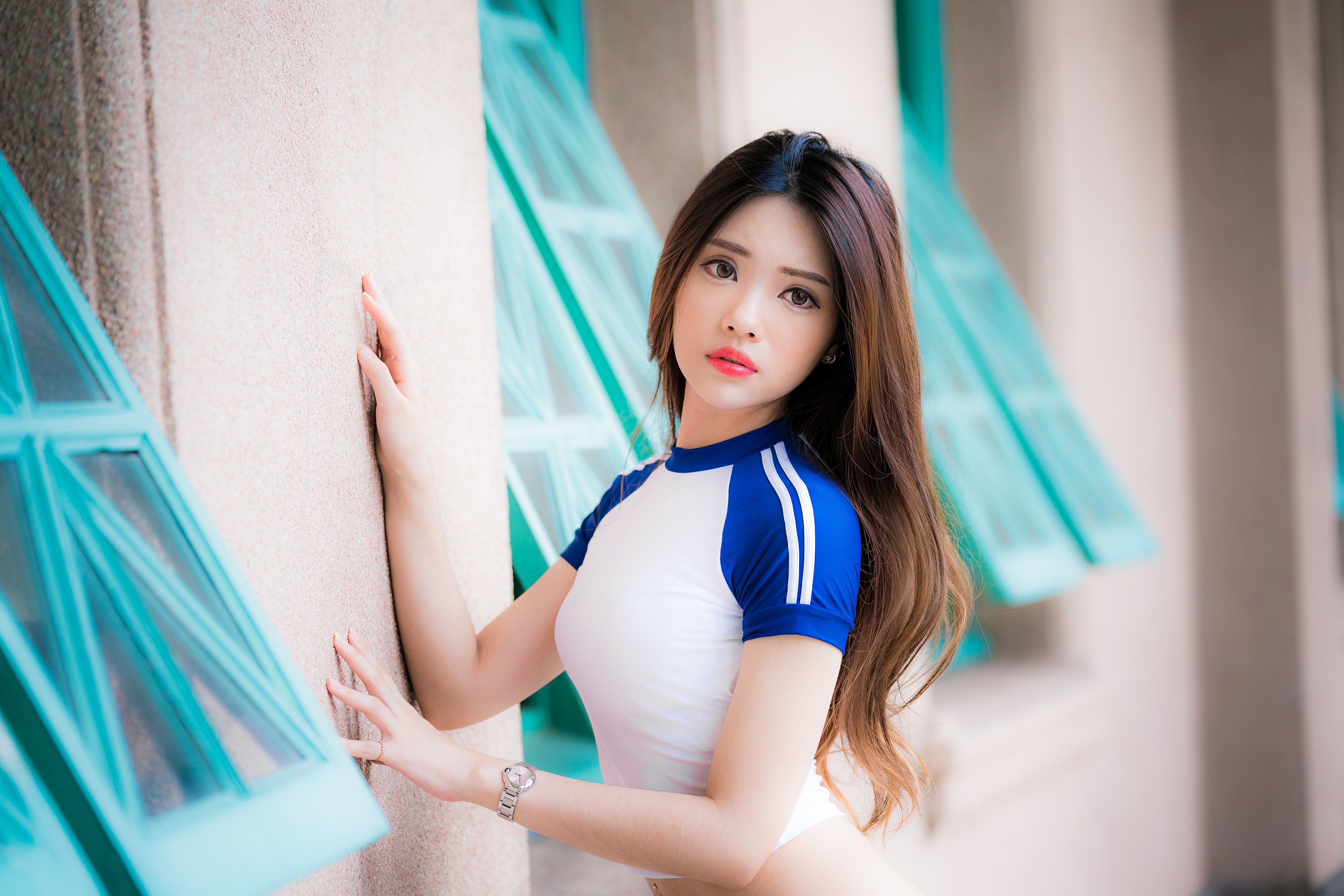 Asian woman with brown hair in a blue and white top HD Wallpaper