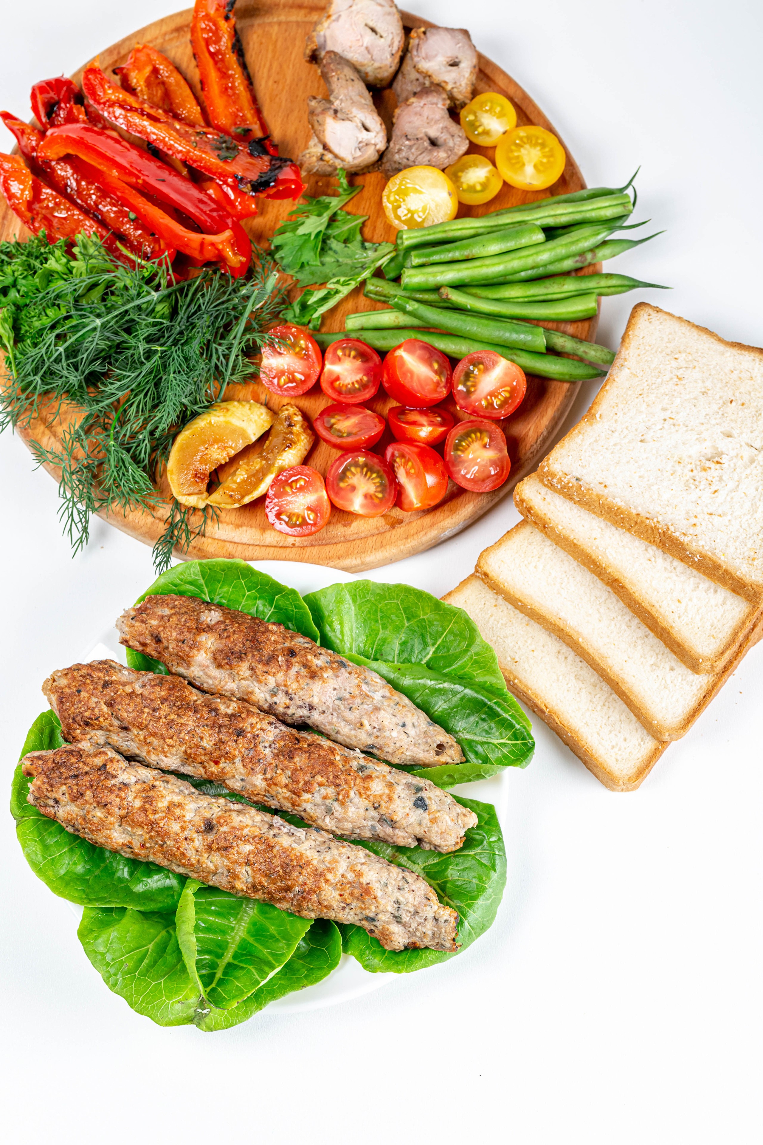 Kebab, vegetables, and bread on a white background HD Phone Wallpaper