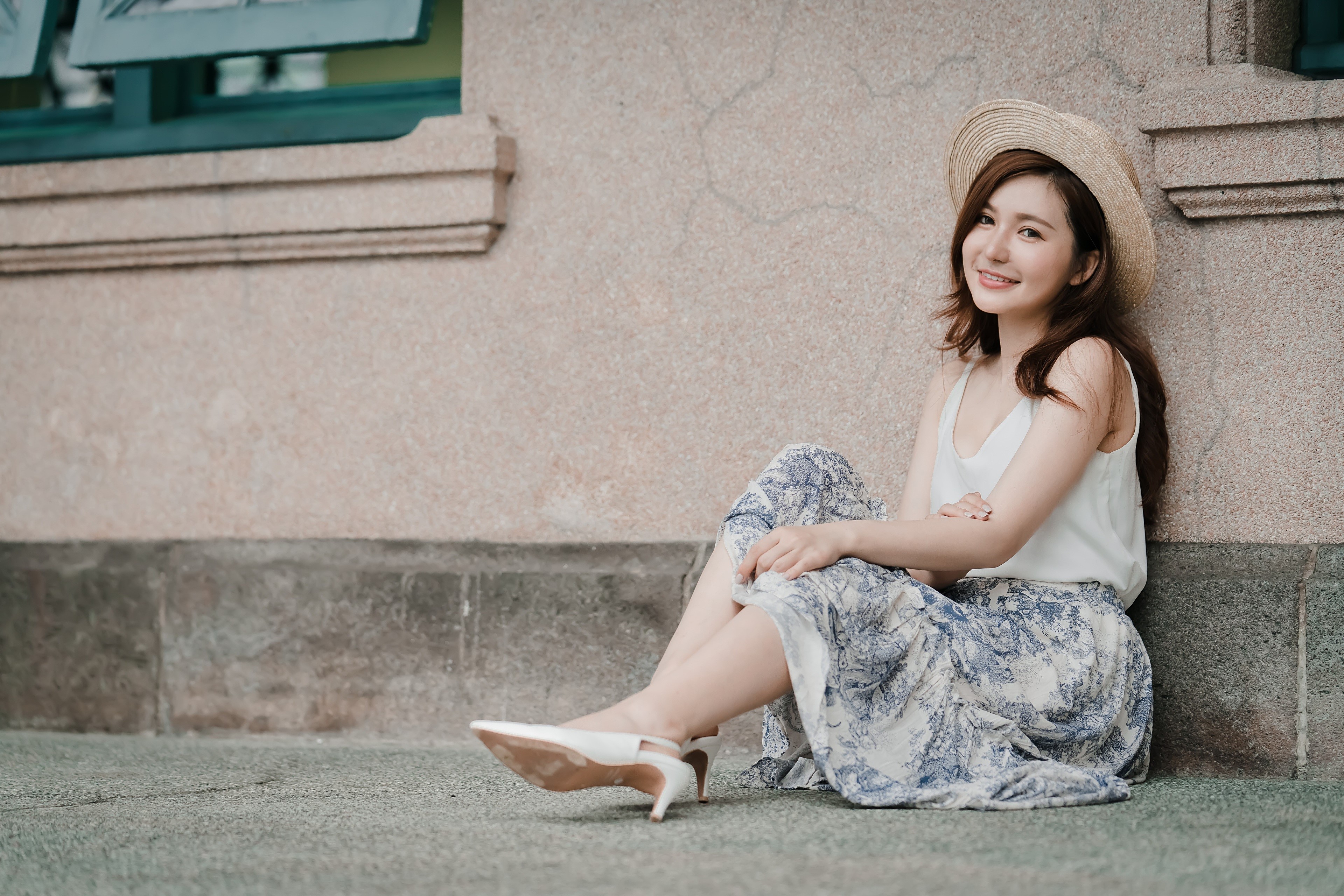 Asian woman with brown hair wearing a hat and skirt HD Wallpaper