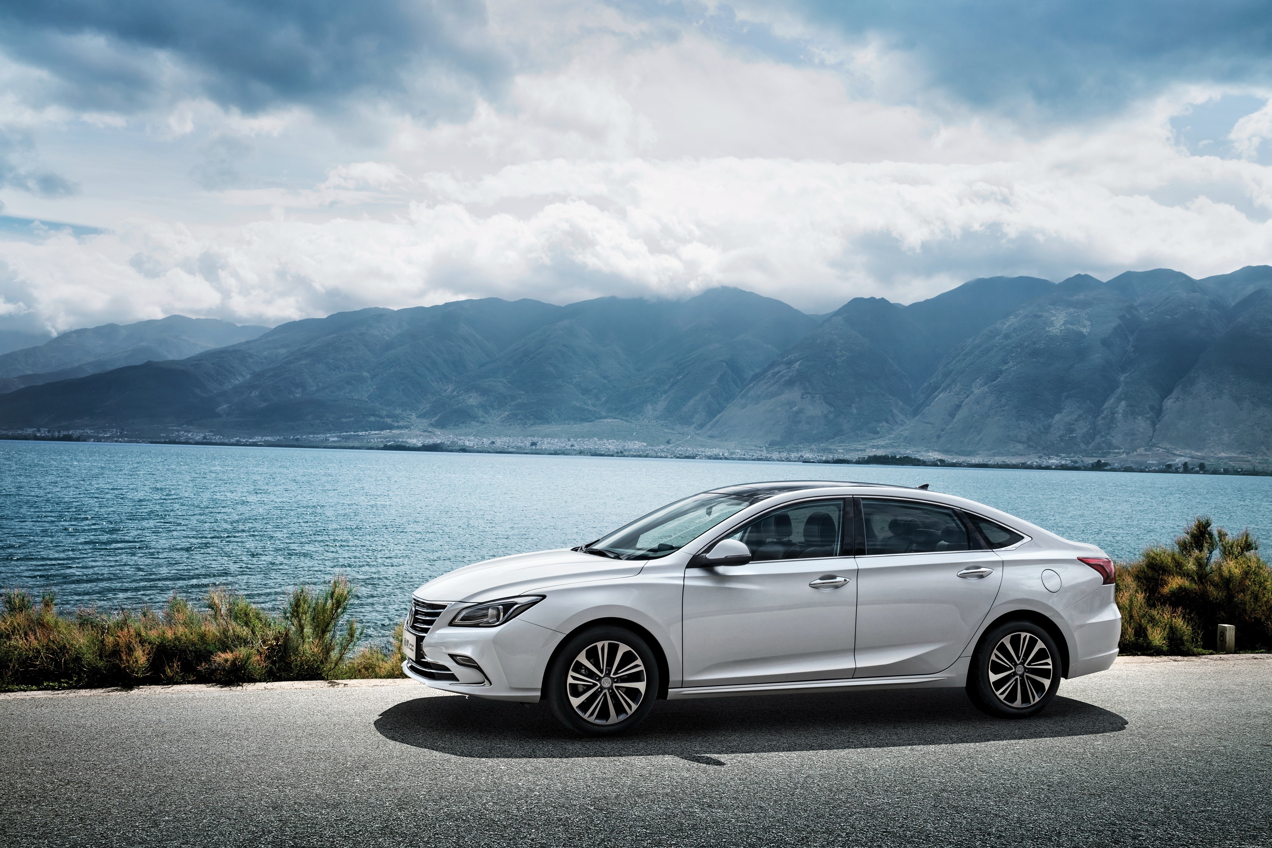 White Changan Sedan by a Lake HD Wallpaper