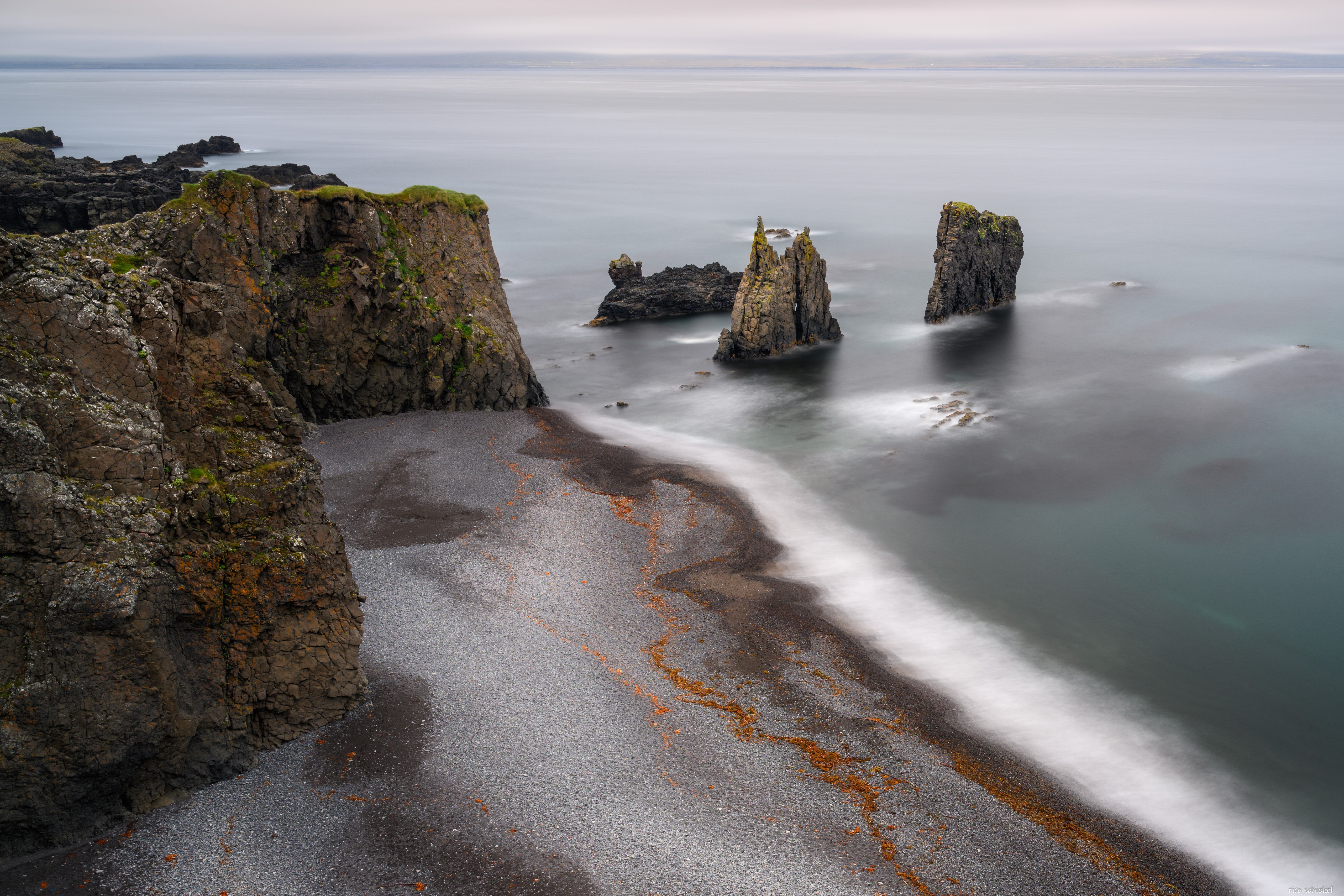 Icelandic Coastline with Sea Stacks and Black Sand Beach HD Wallpaper