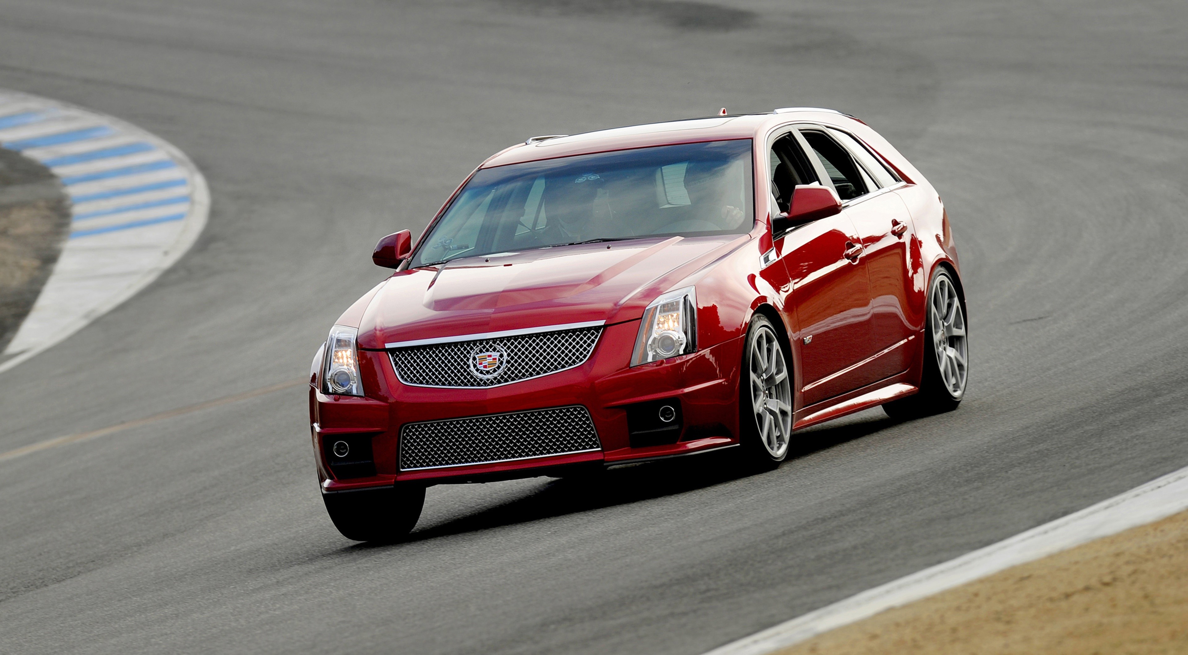 4K Red Cadillac CTS-V Sport Wagon on a Racetrack HD Wallpaper
