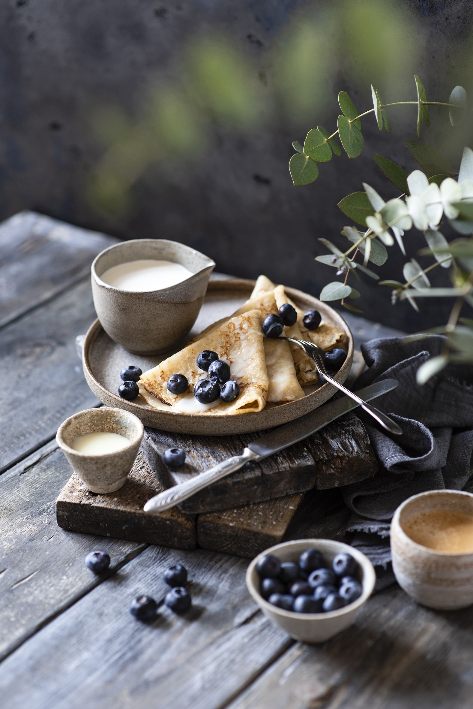 Pancakes with blueberries and cream on wooden planks HD Phone Wallpaper