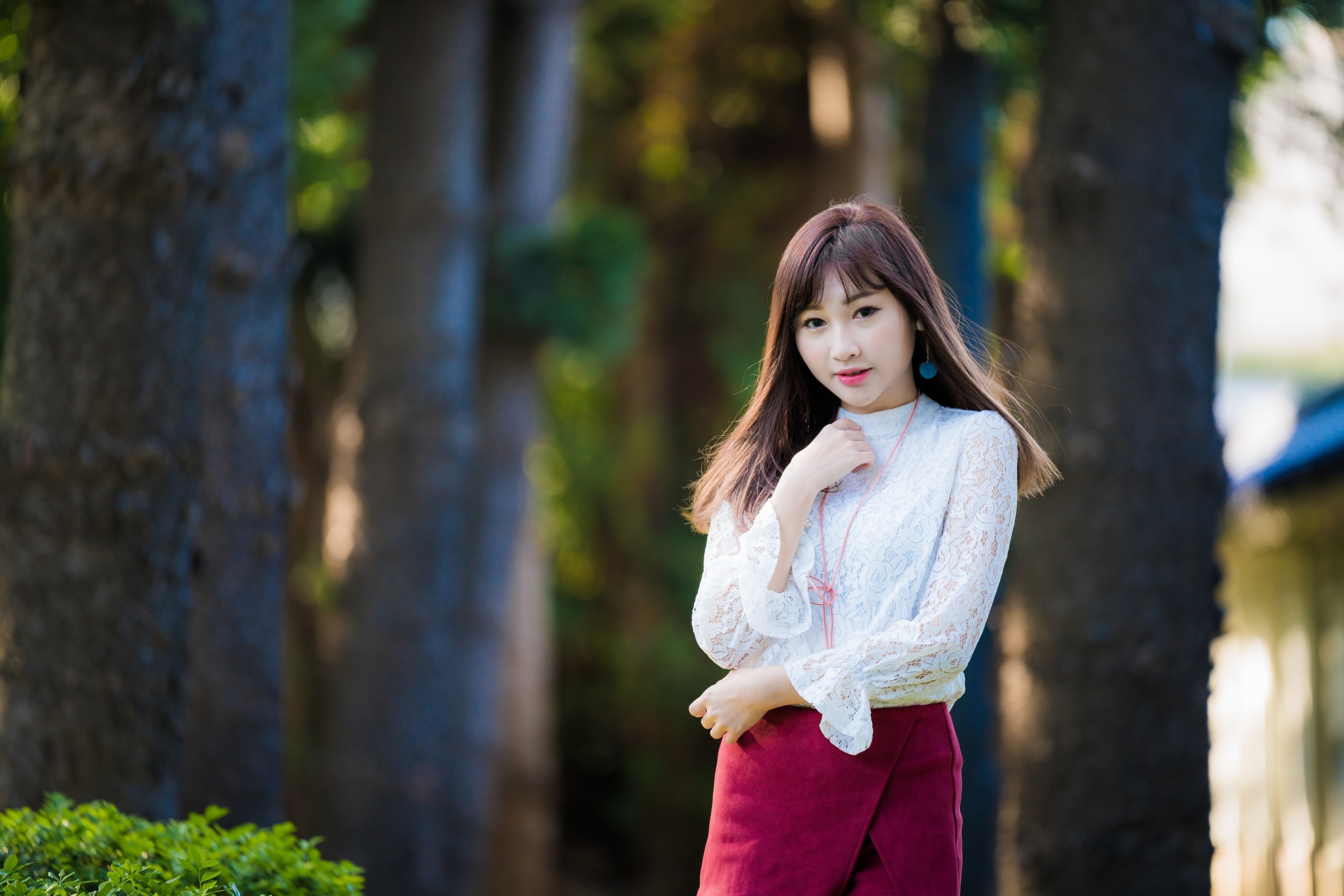 Asian woman with brown hair in a white top and red skirt HD Wallpaper