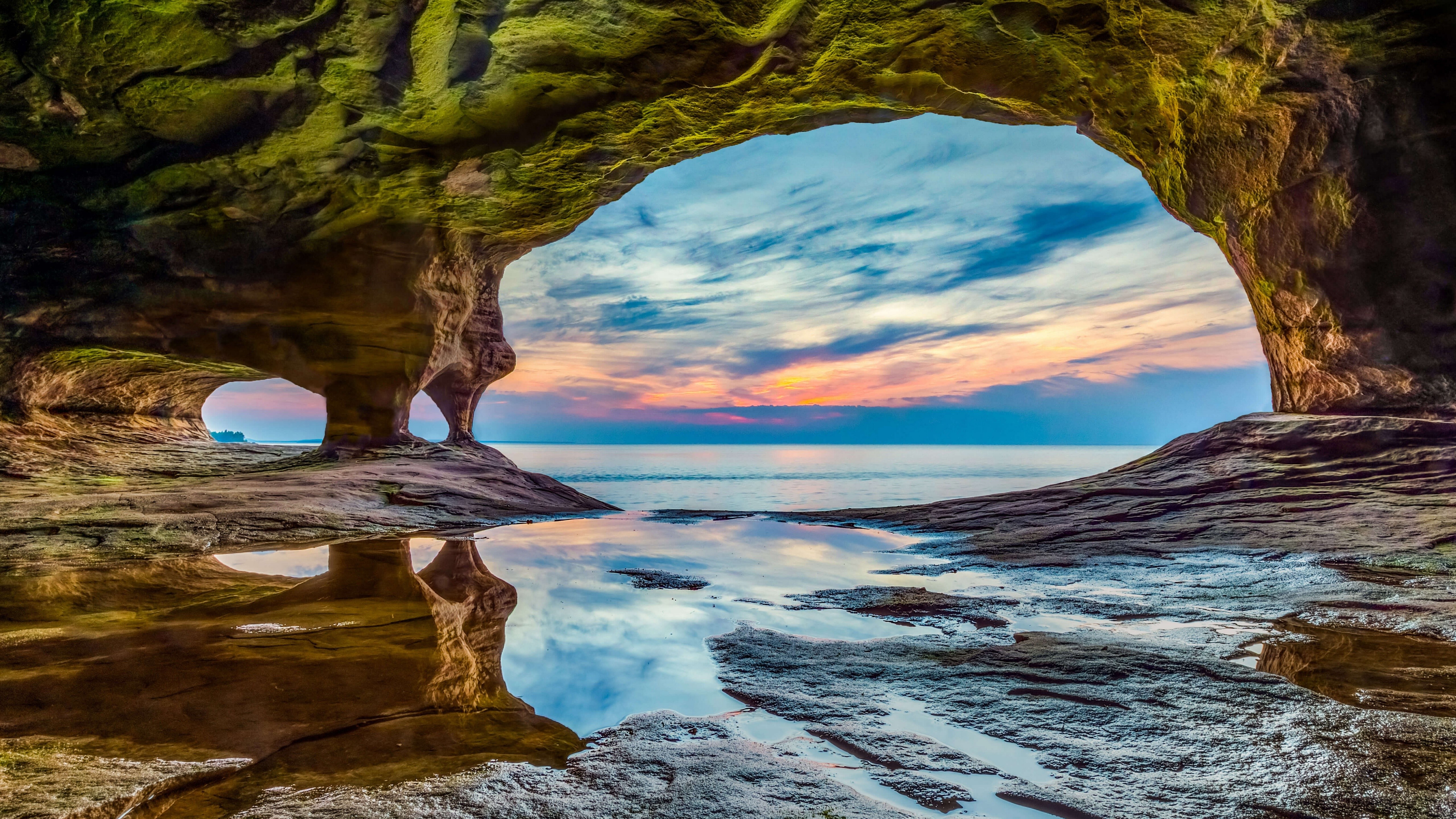 Cave entrance overlooking Lake Superior at sunset HD Wallpaper