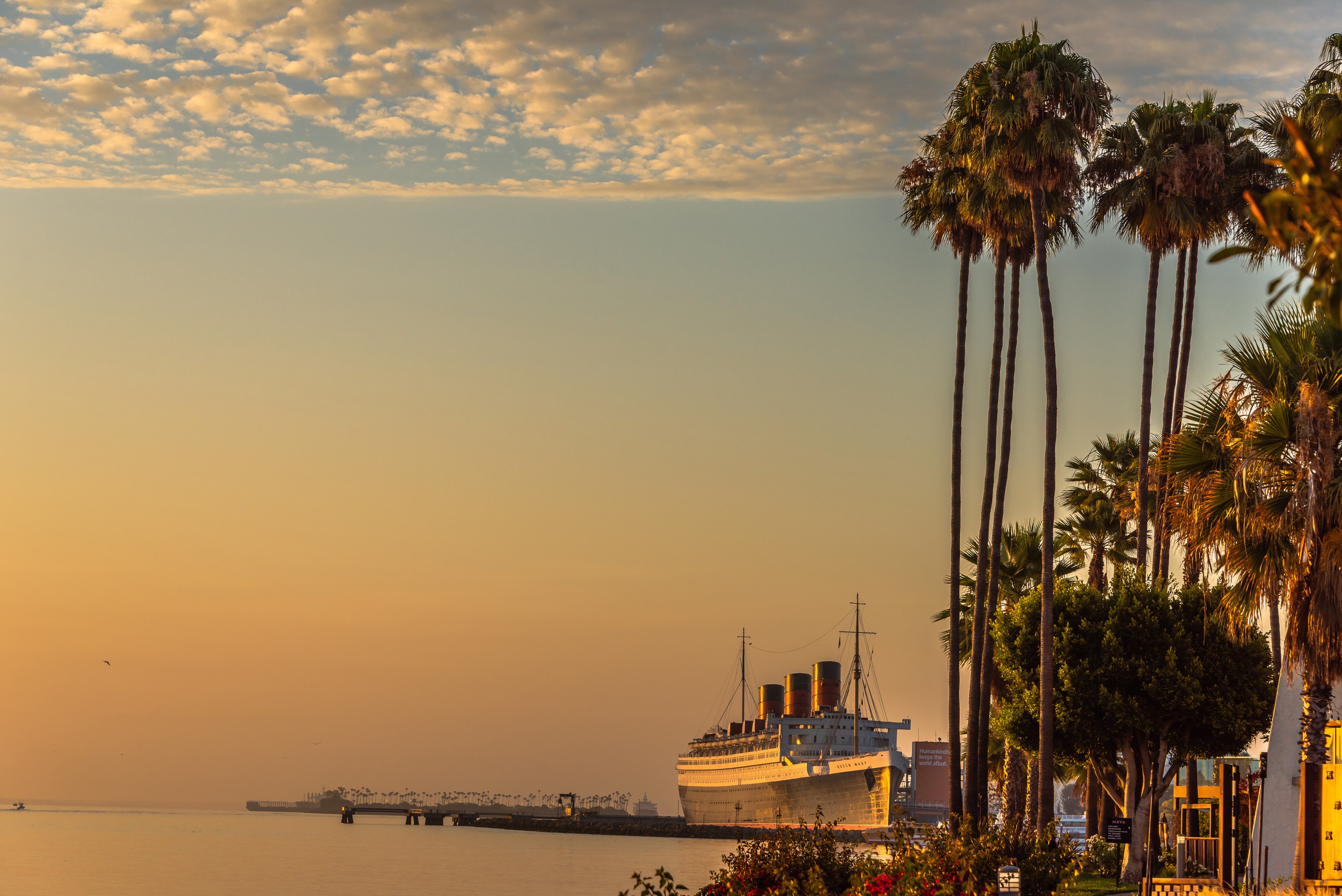 The Queen Mary ship docked in Long Beach, California at sunset HD Wallpaper