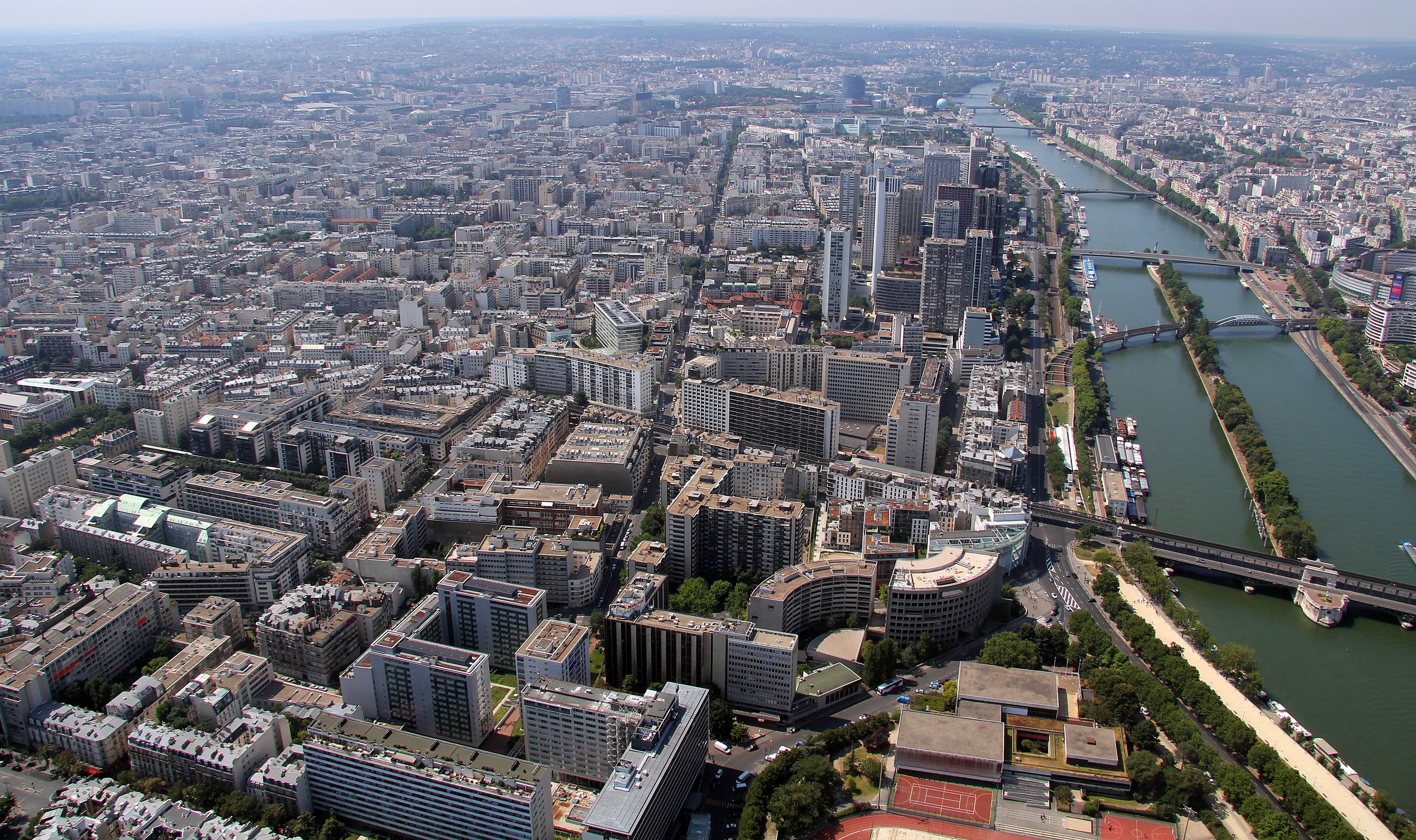 Aerial view of Paris with the Seine River and bridges HD Wallpaper