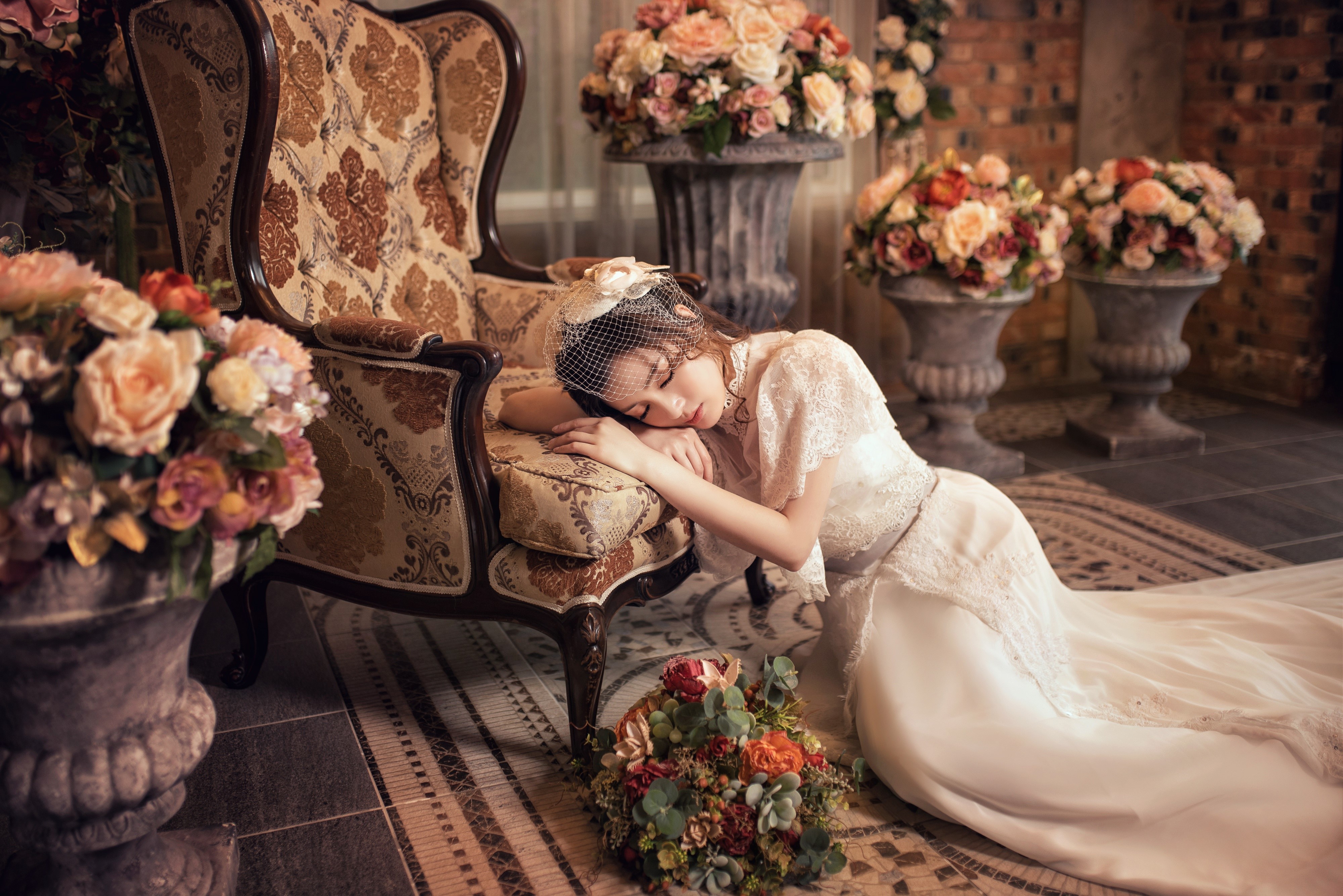 4K Asian Bride Lying by Floral Armchair HD Wallpaper