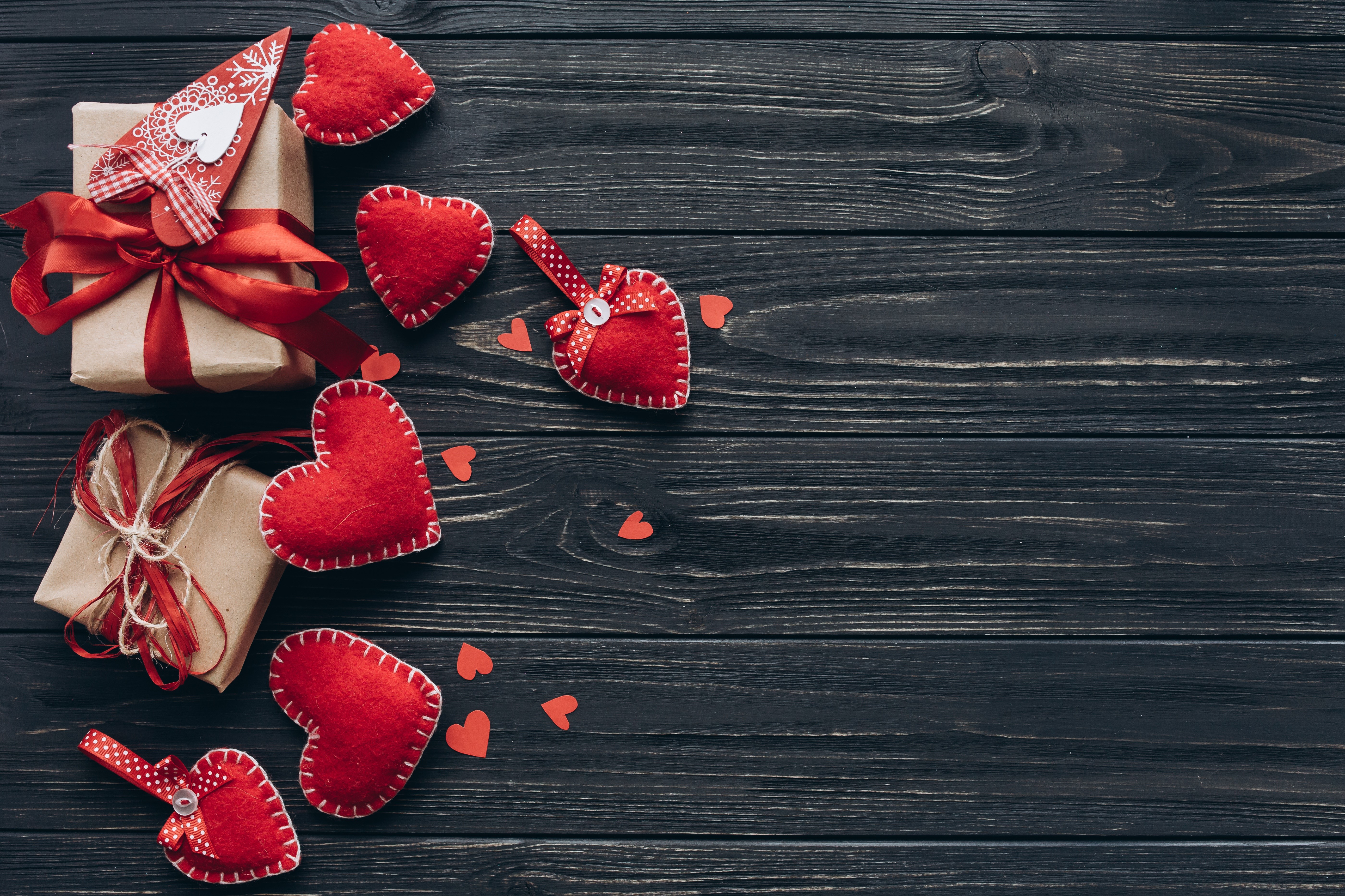 Valentine's Day gifts and hearts on dark wood HD Wallpaper