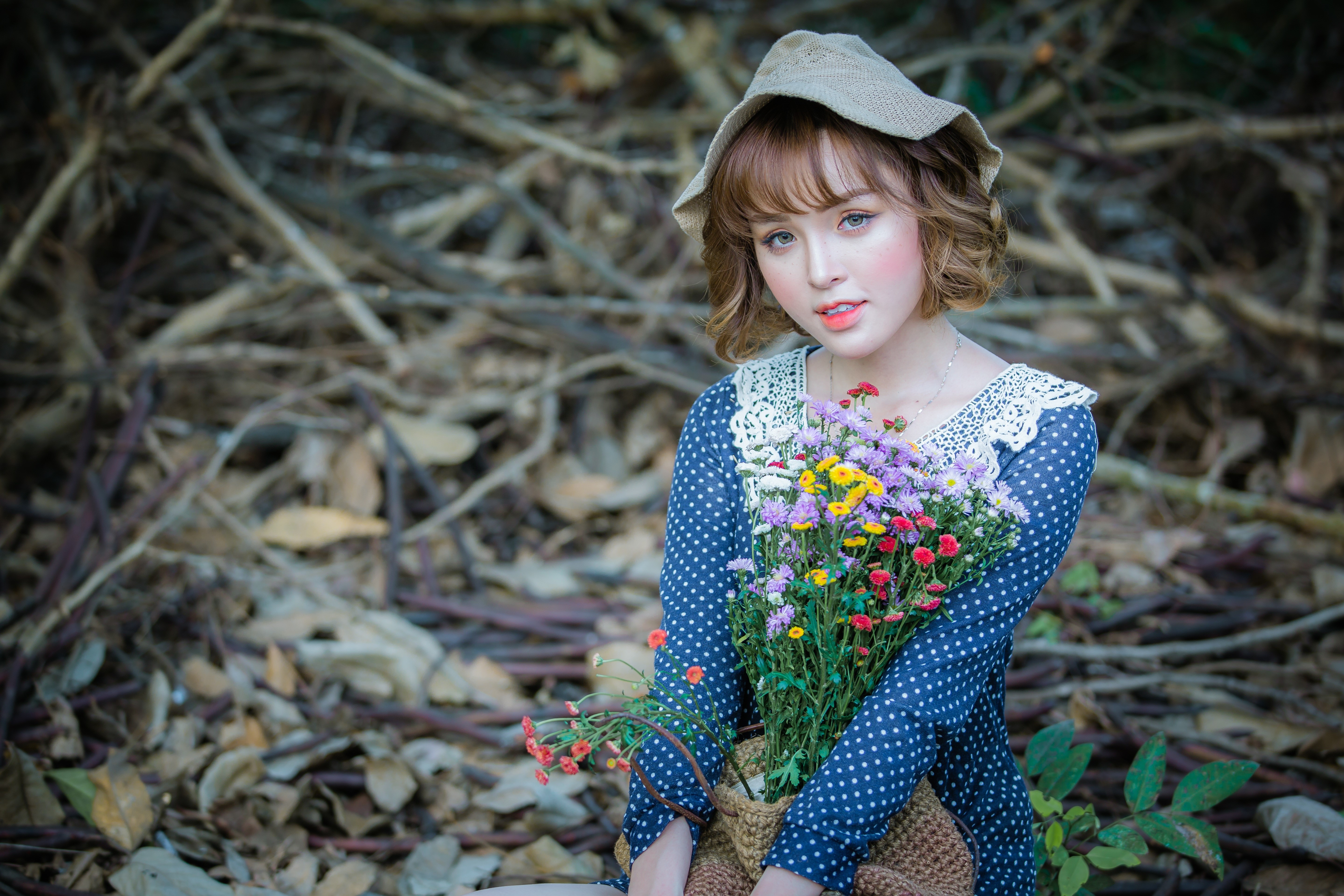 Asian woman with flowers and hat HD Wallpaper