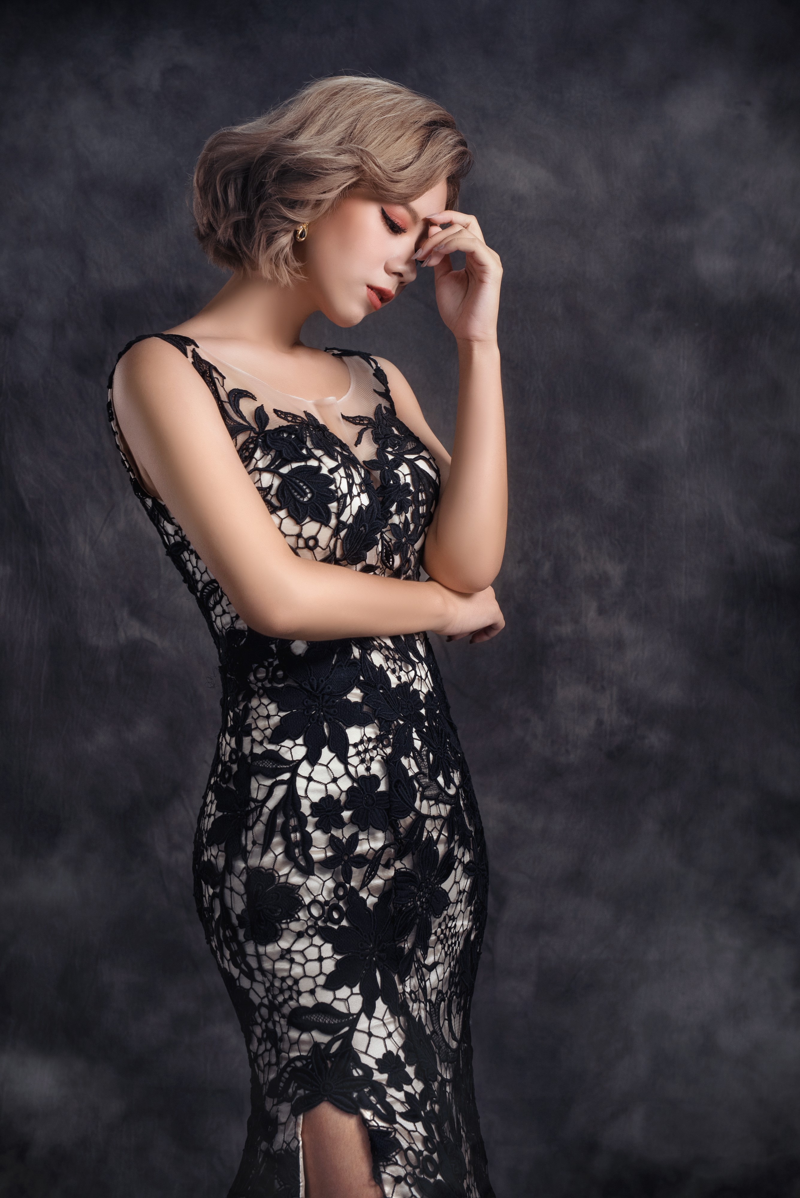 Woman in a black lace dress posing HD Phone Wallpaper