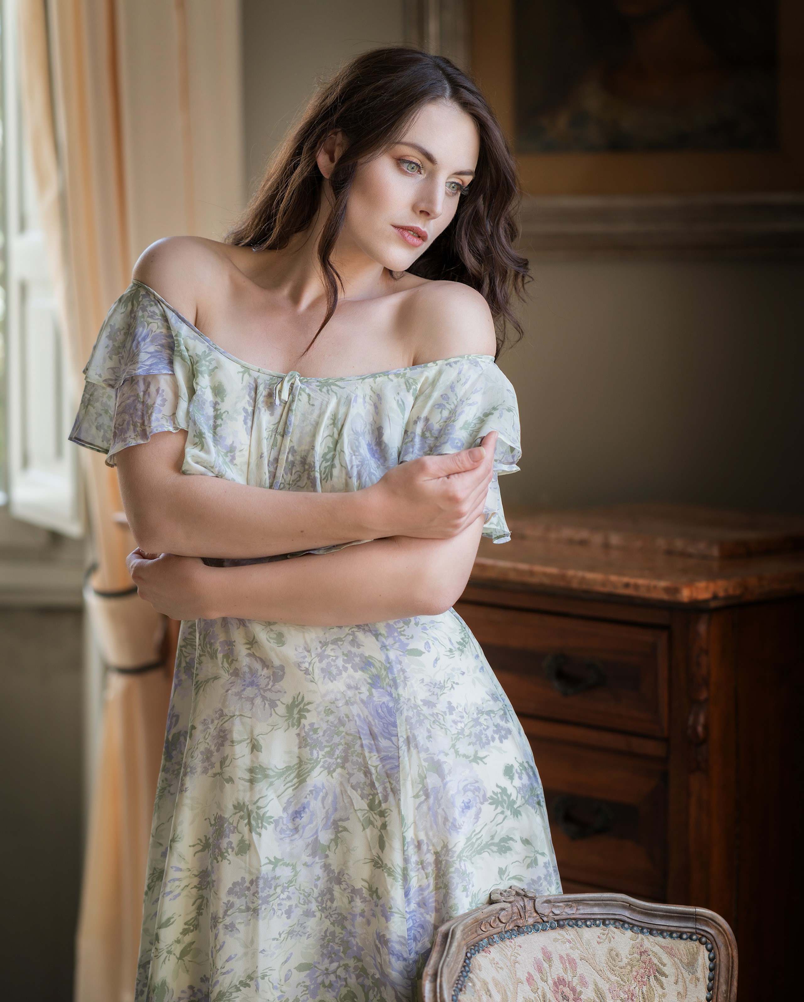 Woman in a floral dress posing indoors HD Phone Wallpaper