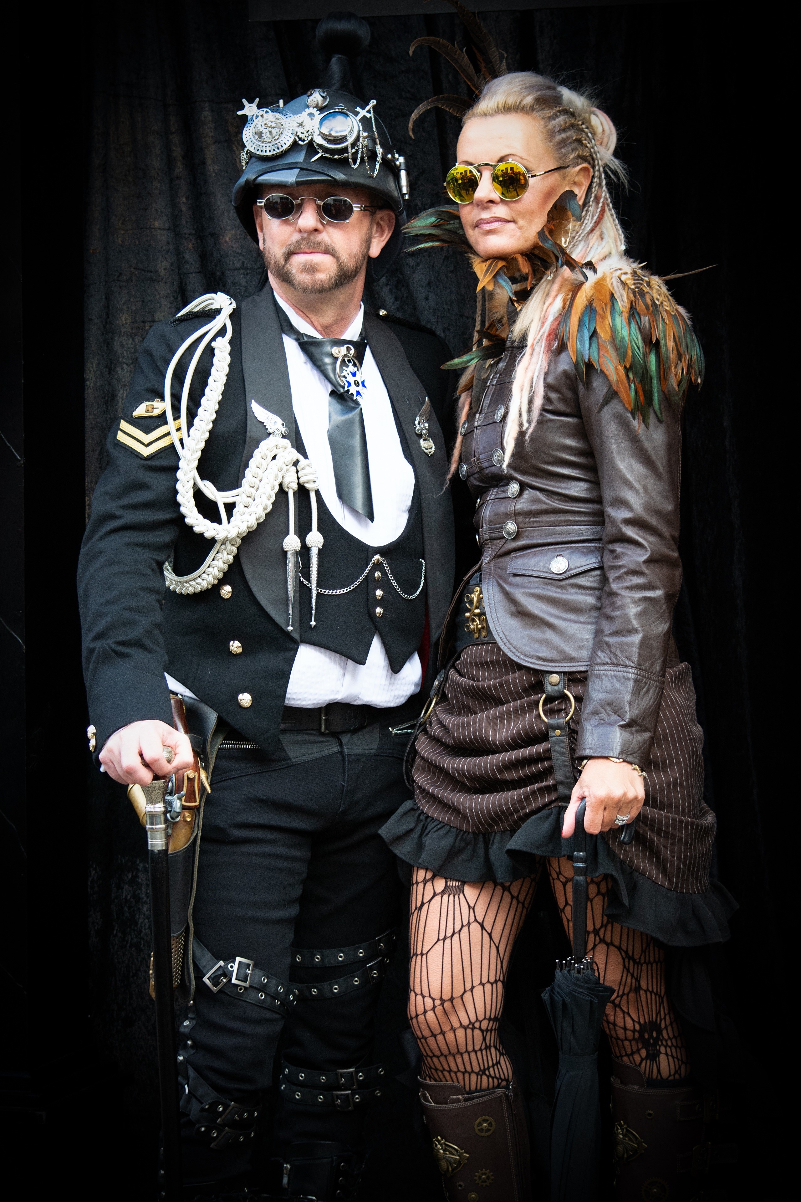 Steampunk couple in elaborate costumes HD Phone Wallpaper