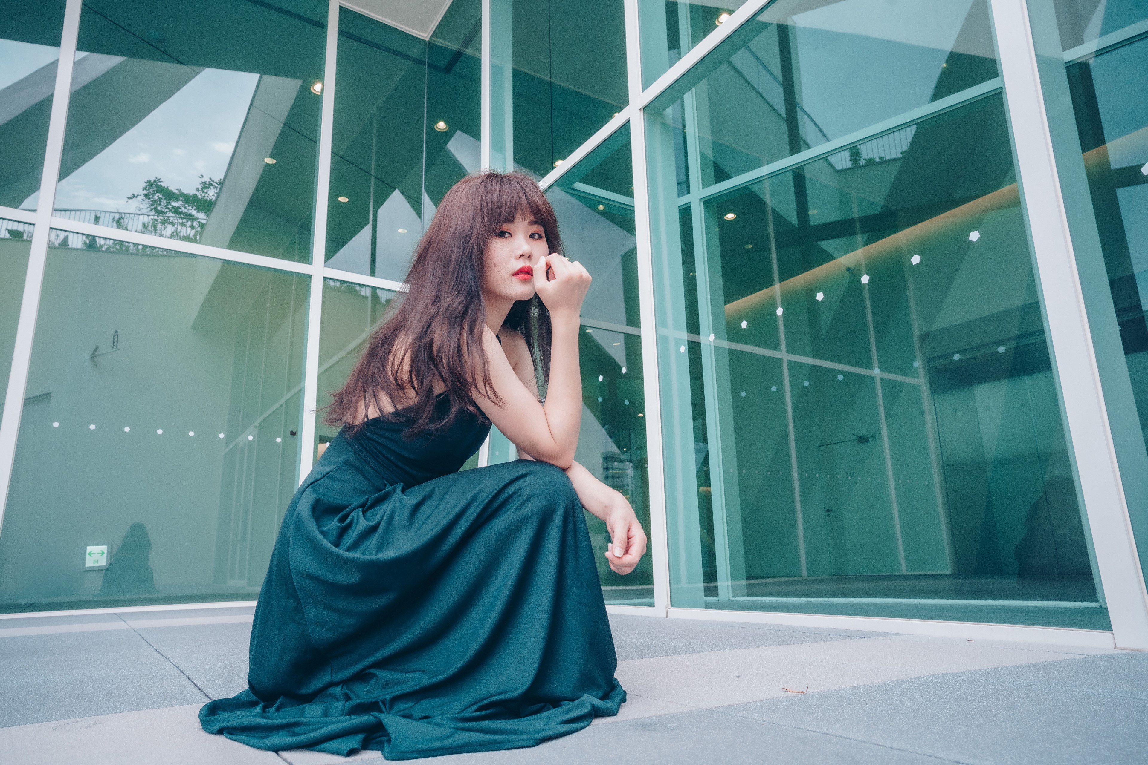 4K Asian Woman Sitting in Elegant Dress HD Wallpaper