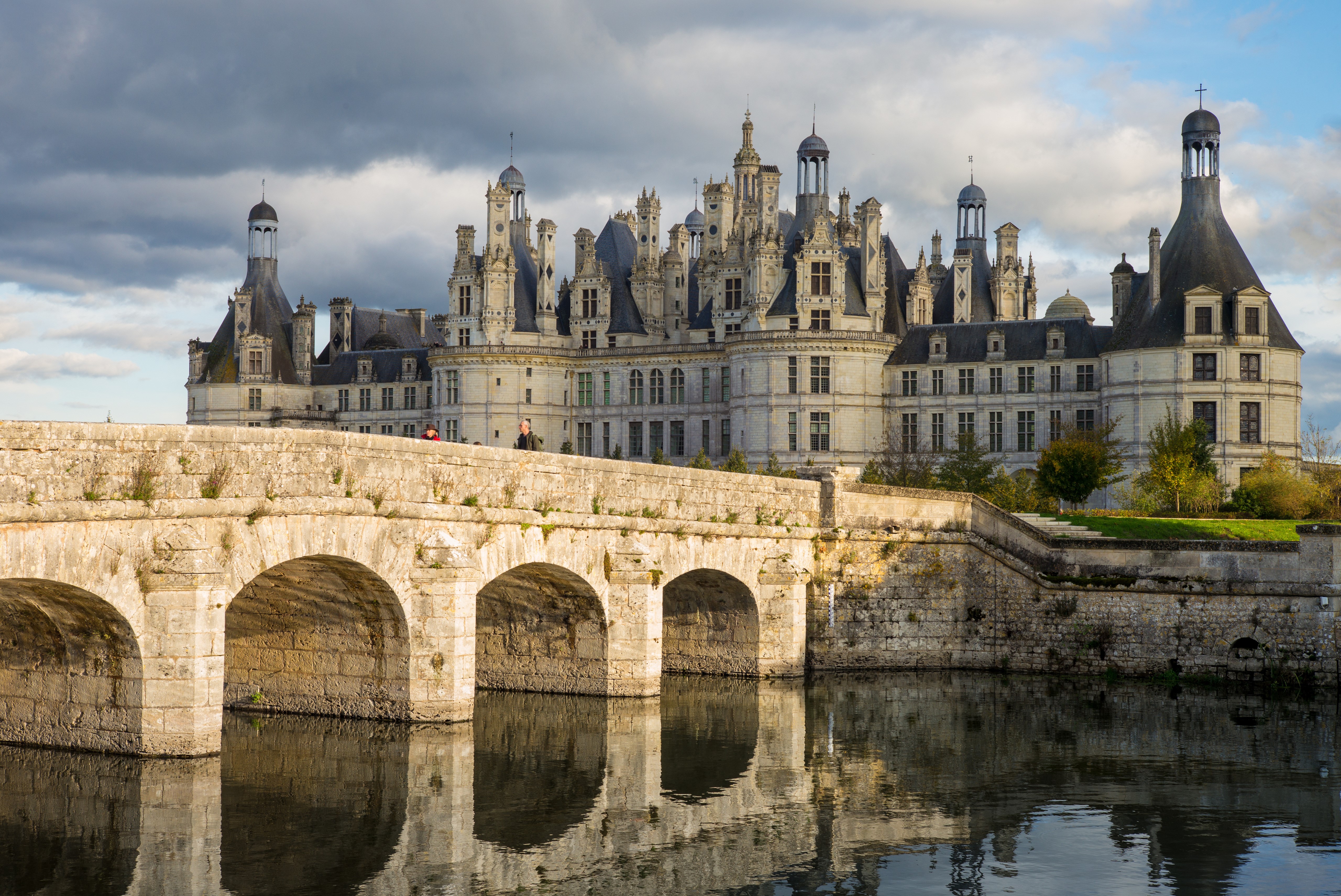 Chateau de Chambord castle and bridge over river in France HD Wallpaper