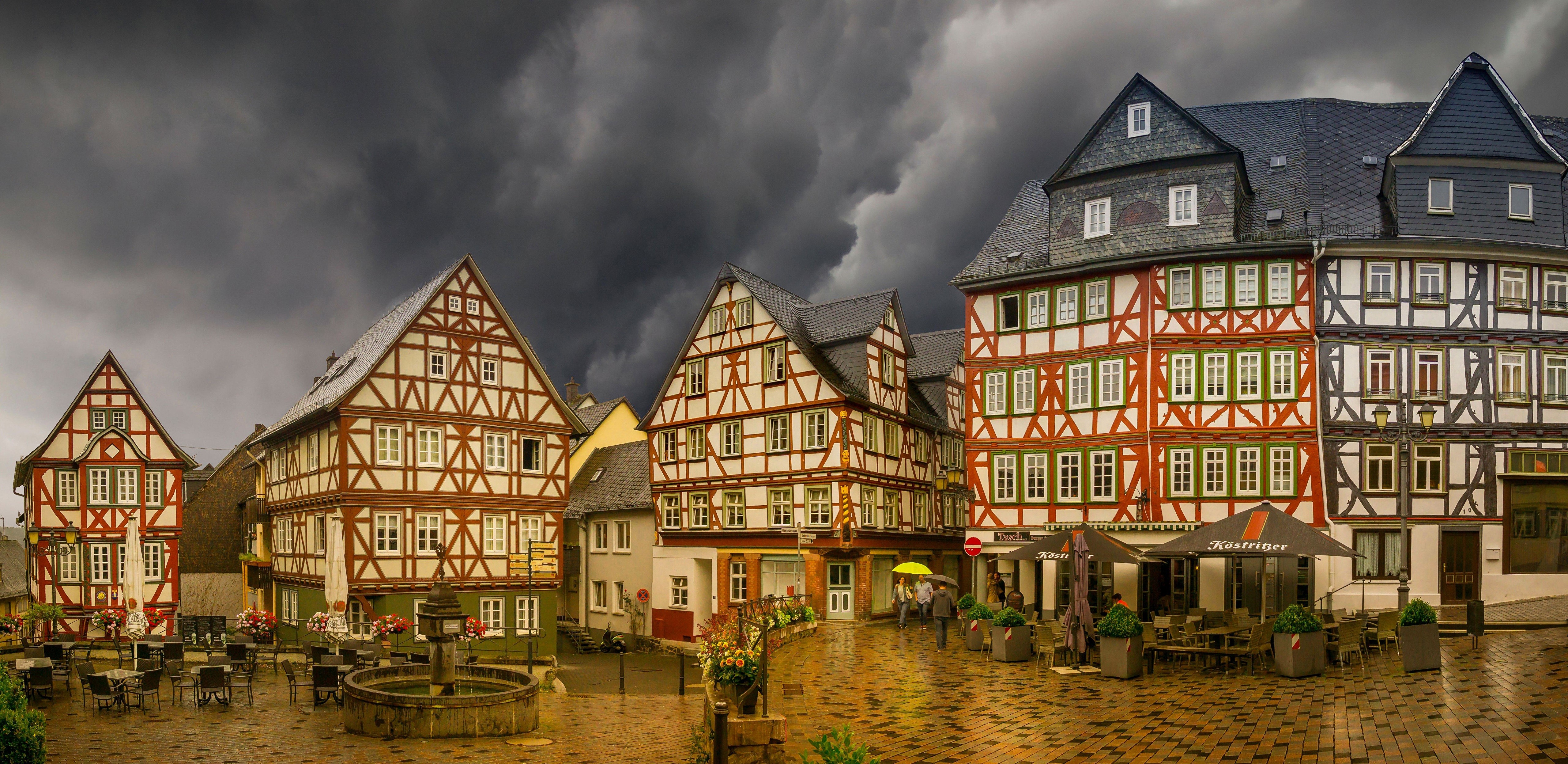 Half-timbered houses in Wetzlar, Germany during a rainstorm HD Wallpaper