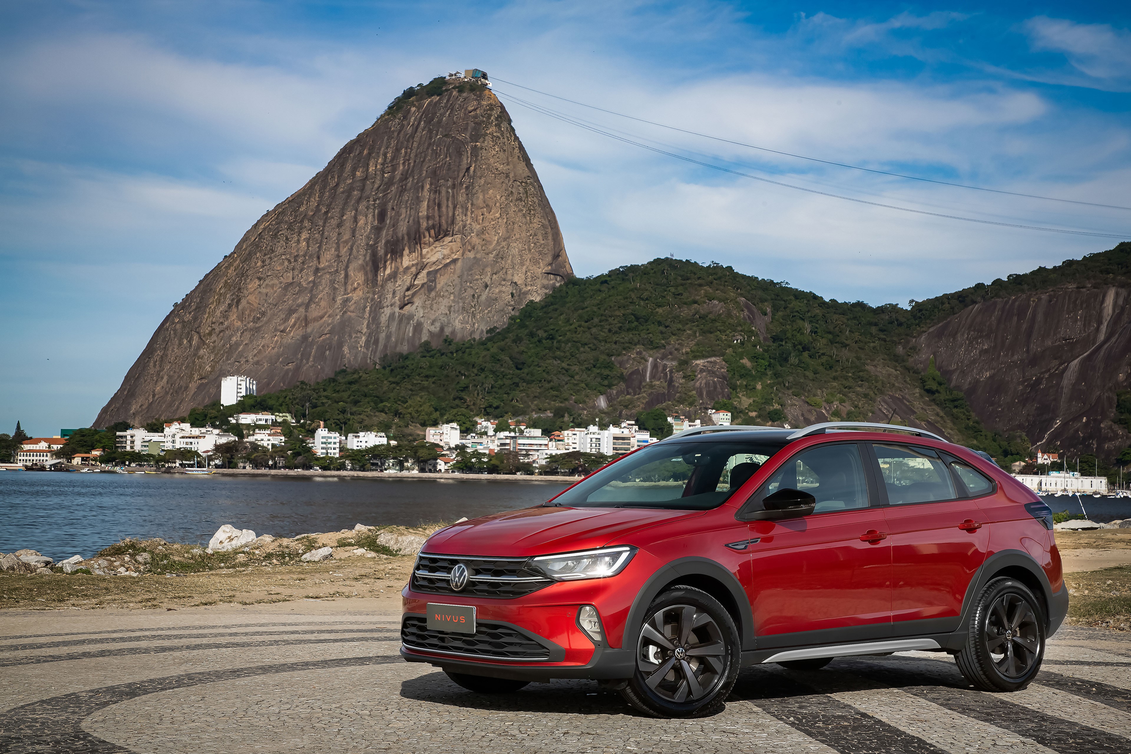 Red Volkswagen Nivus Highline 200 TSI in Rio de Janeiro HD Wallpaper