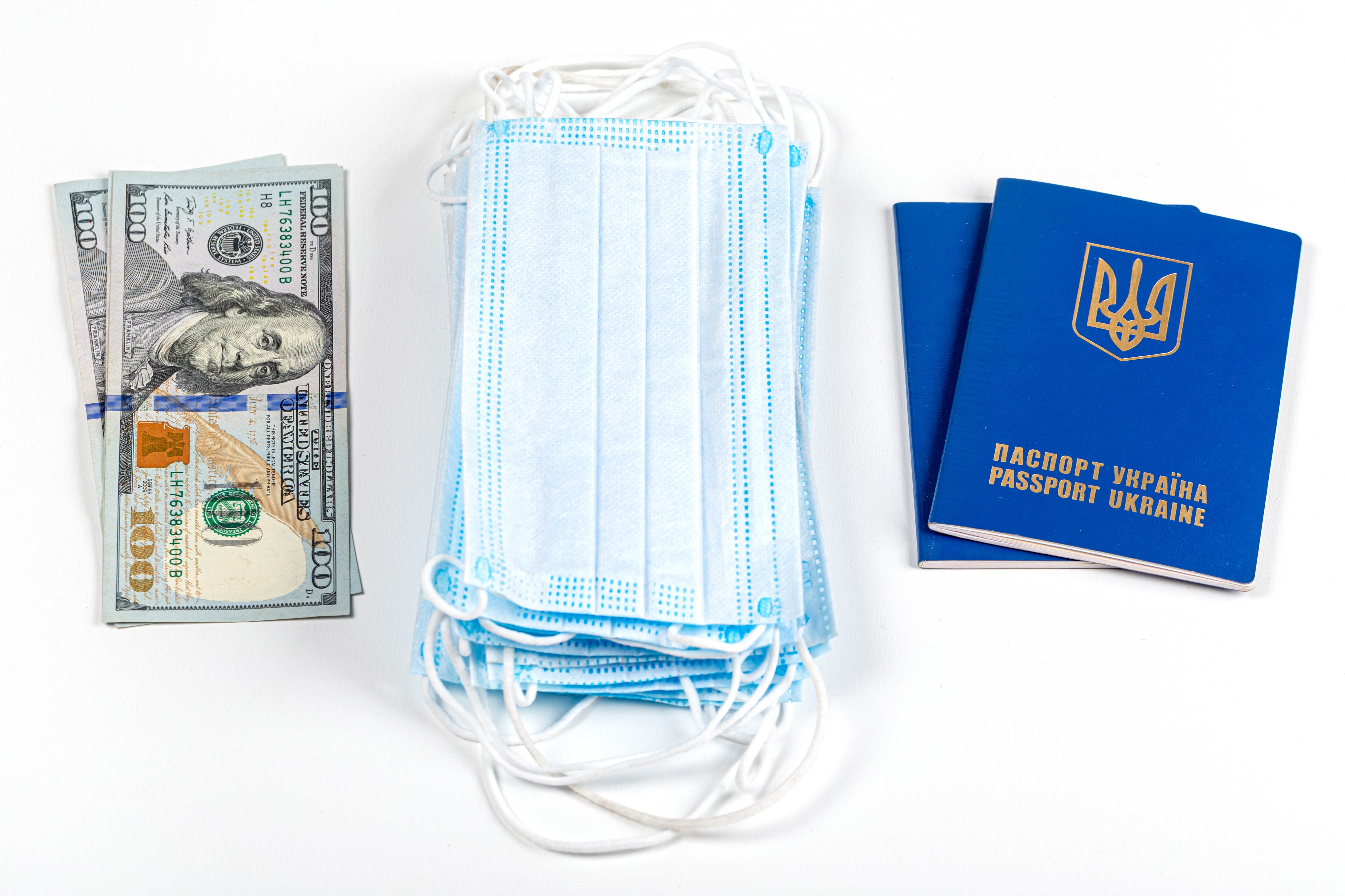 US Dollars, Face Masks, and Ukrainian Passports HD Wallpaper