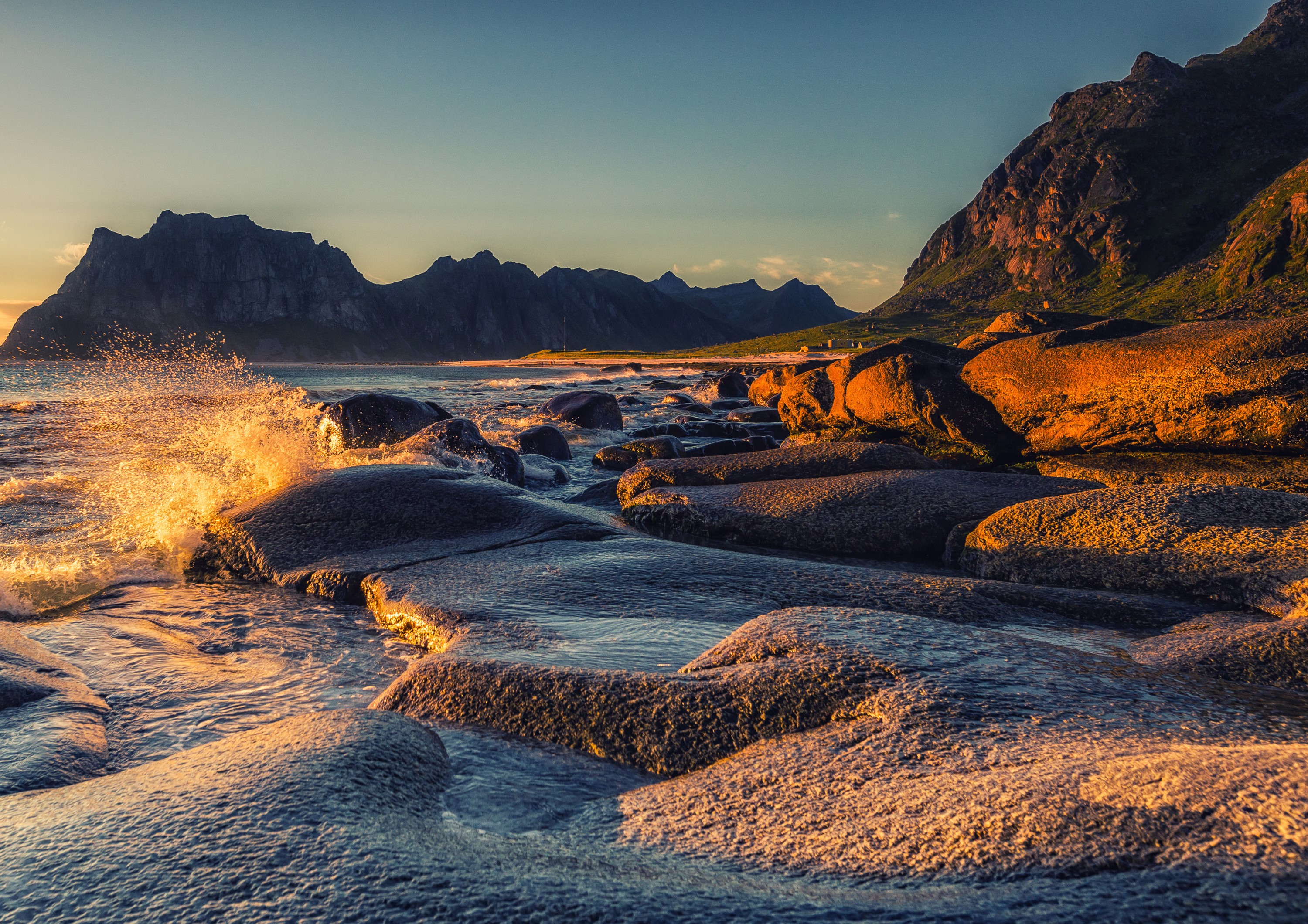 Waves crashing on rocks in Lofoten, Norway at sunset HD Wallpaper
