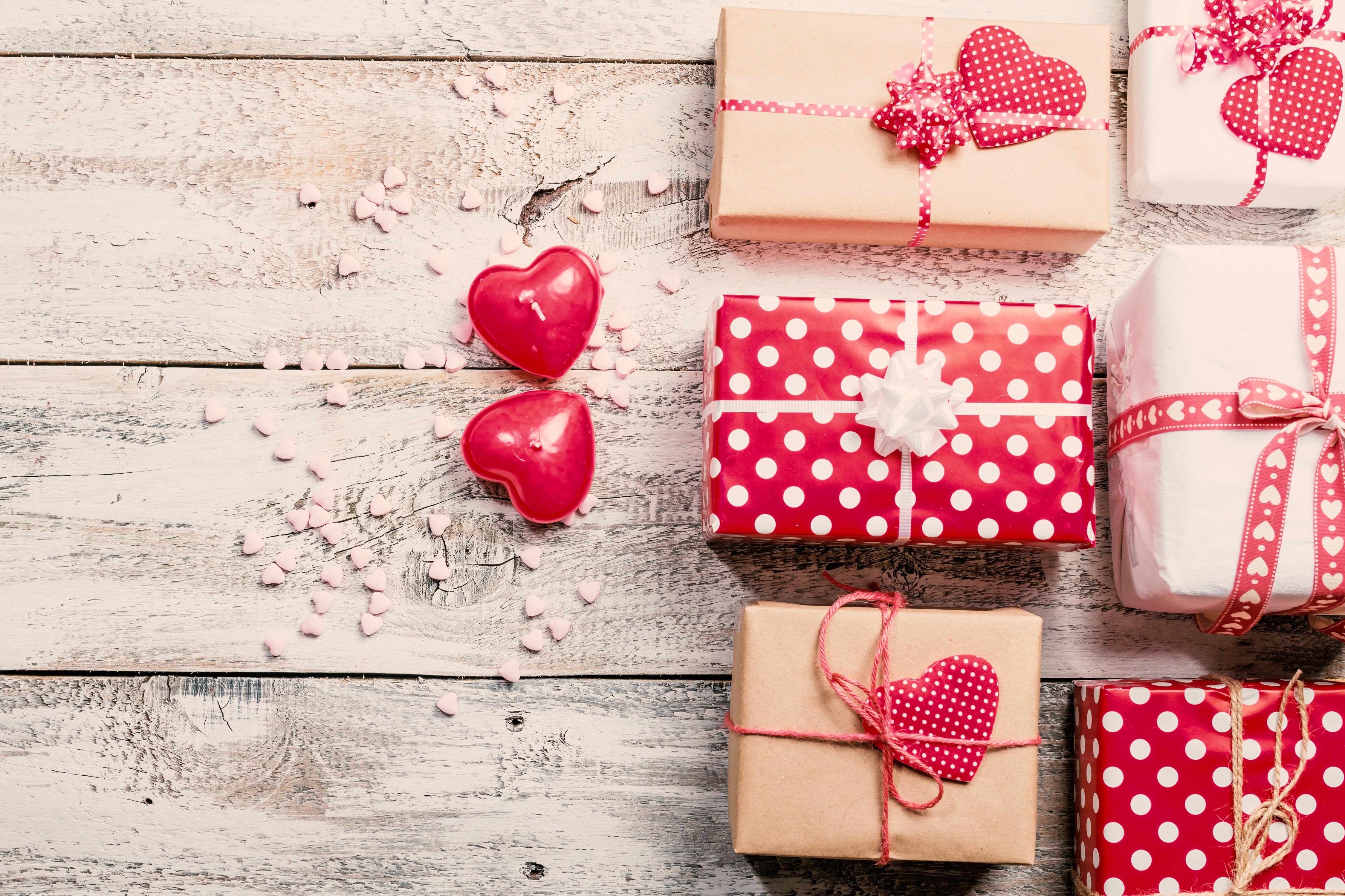 Valentine's Day gifts and heart candles on wood HD Wallpaper