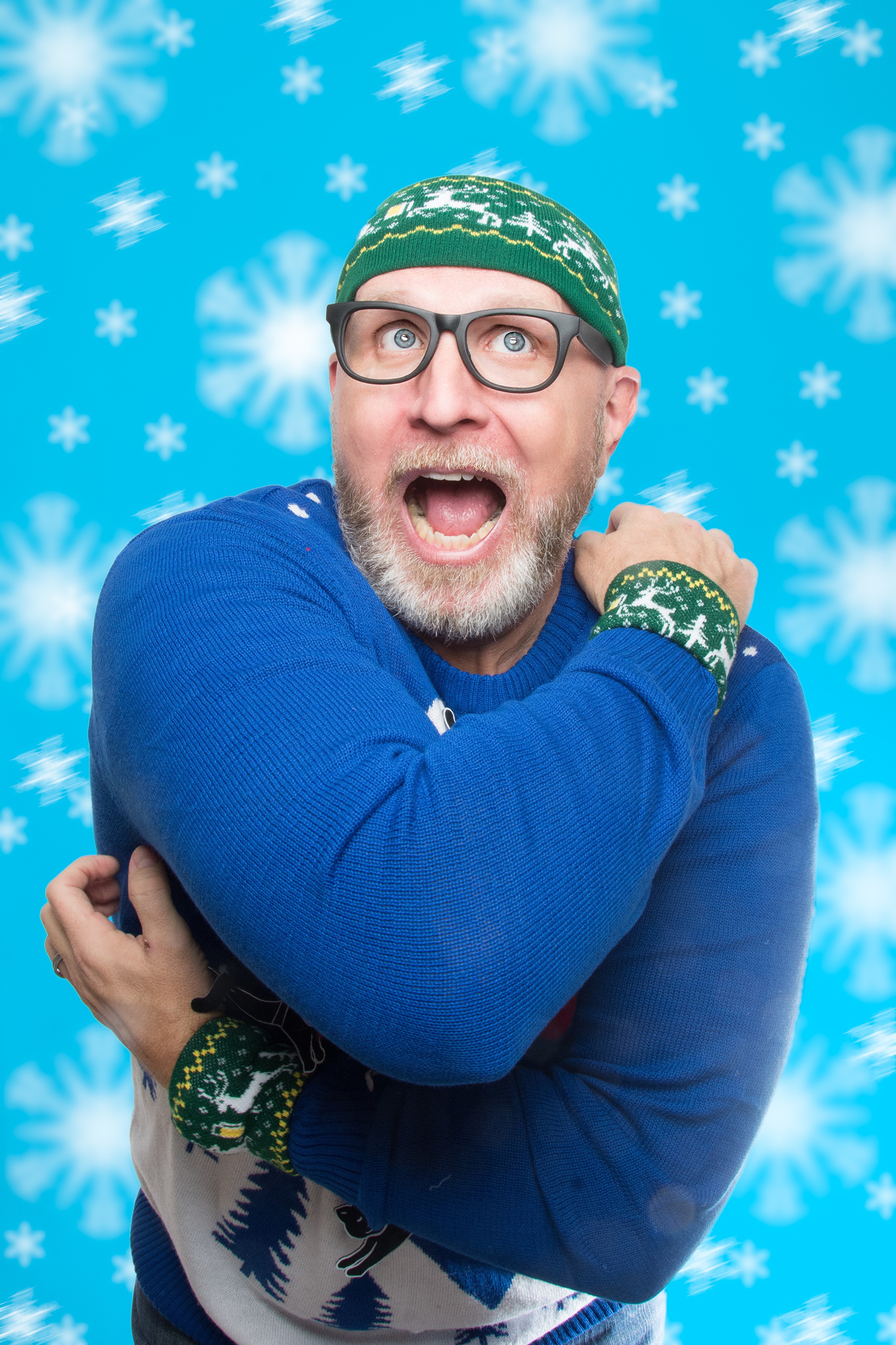 Man in Christmas sweater and hat with snowflakes HD Phone Wallpaper
