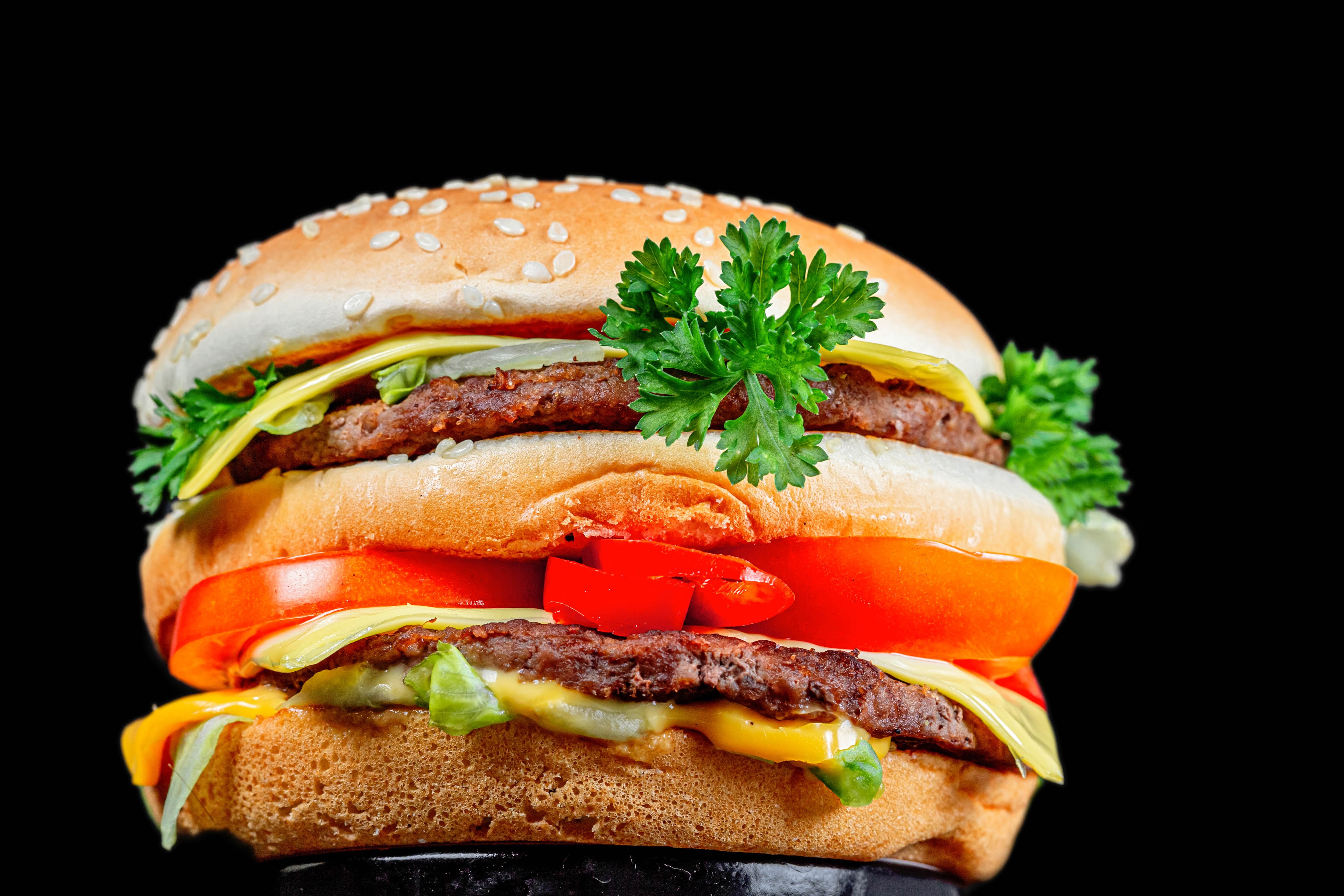 4K Hamburger with Vegetables on Black Background HD Wallpaper